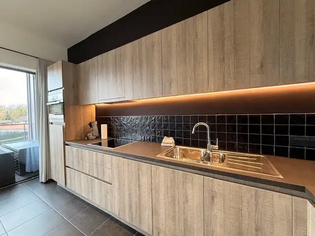 Nieuwbouwappartement met 1 slaapkamer, terras en autostandplaats te Maasmechelen. foto 6