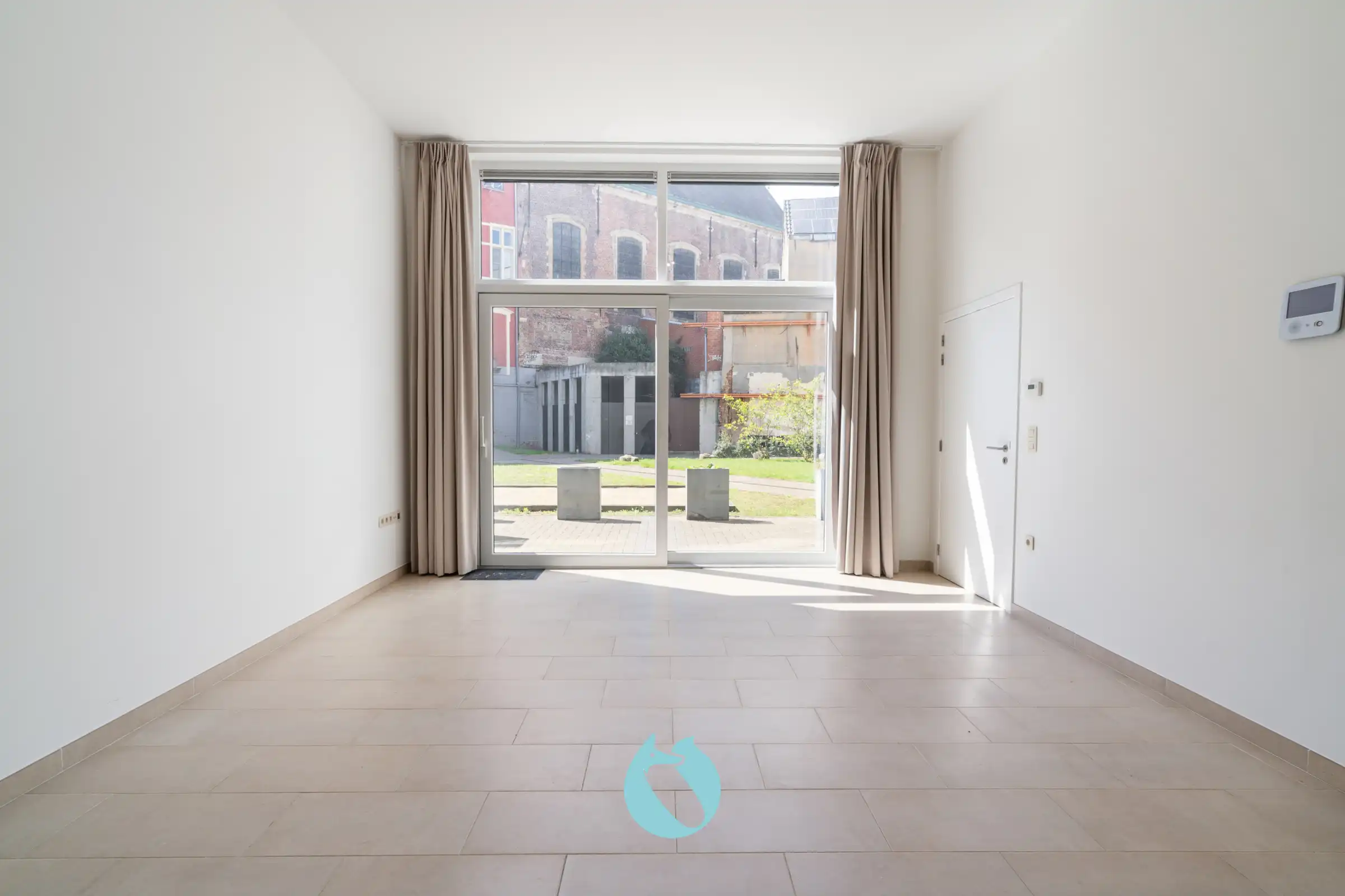 Gelijkvloerse serviceflat met privaat terras foto {{pictureIndex}}
