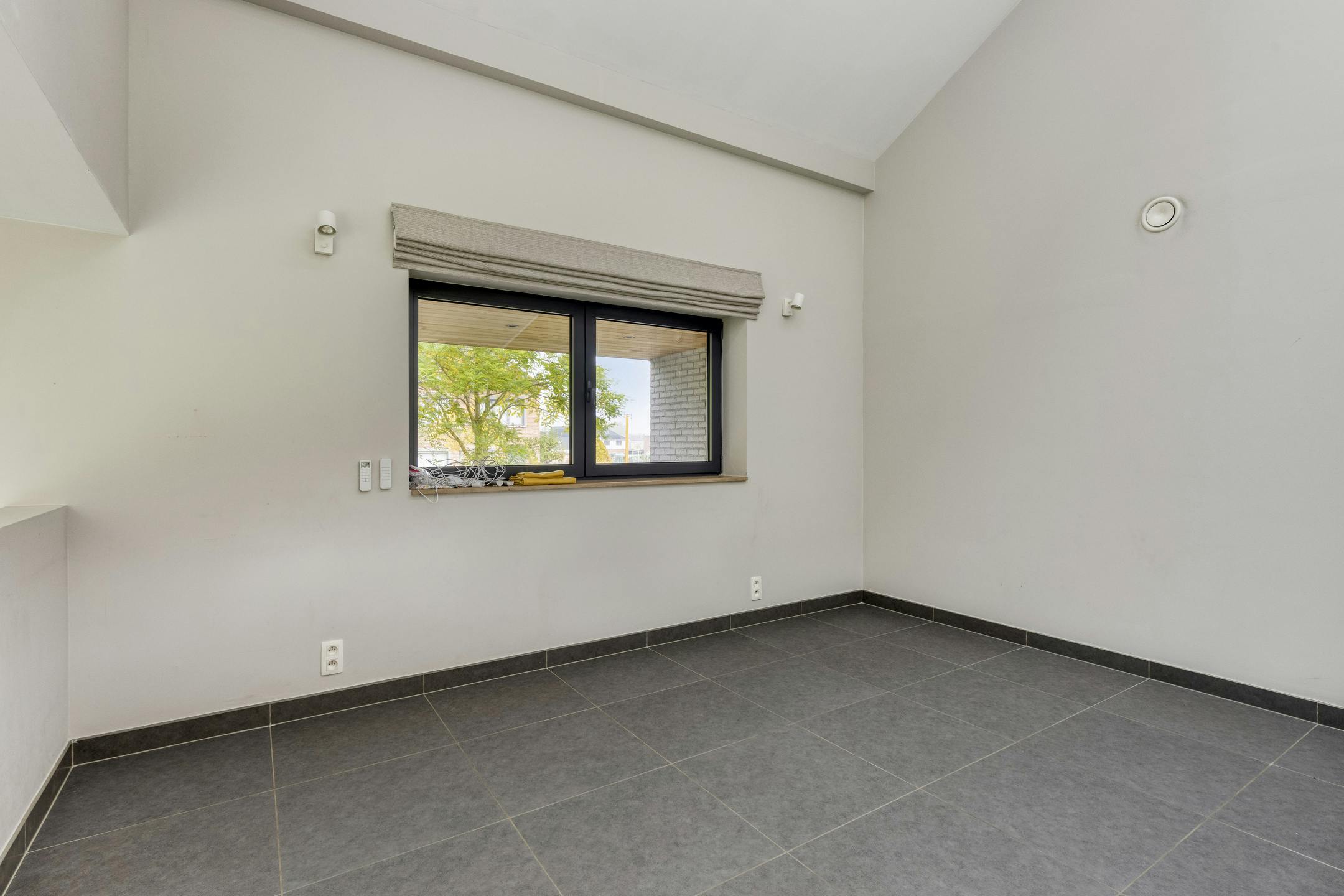 Instapklaar huis met 4 slaapkamers en ruime tuin in Kluisbergen foto 5