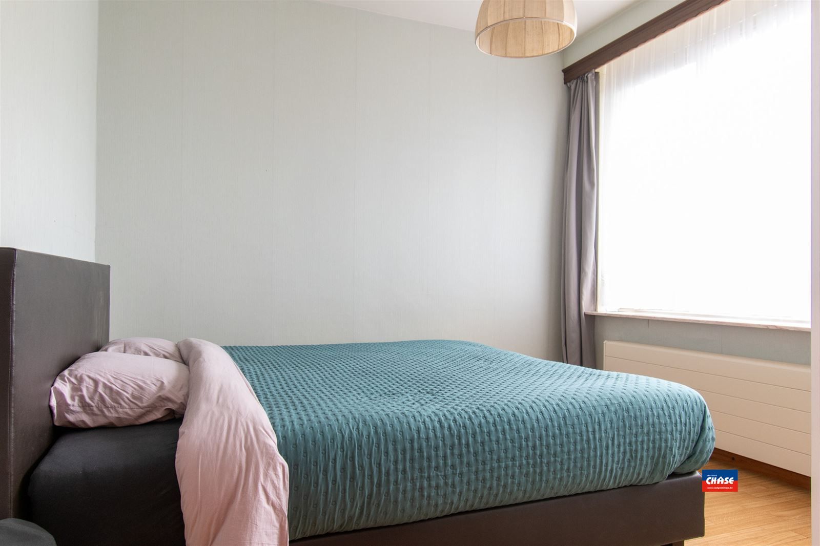 Instapklare gezinswoning met 3 tot 5 slaapkamers,tuin en garagebox foto 16