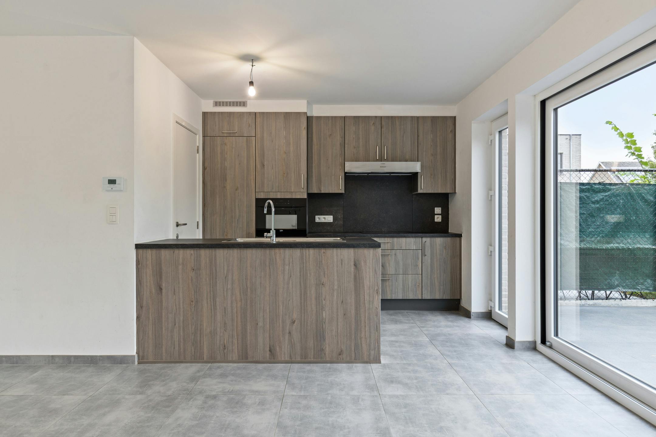 Instapklare woning met carport te koop in centrum Eeklo foto 6