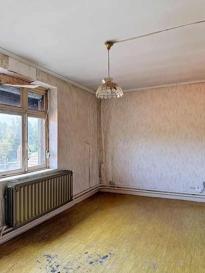Te renoveren gezinswoning met ruime tuin in Tienen foto 10