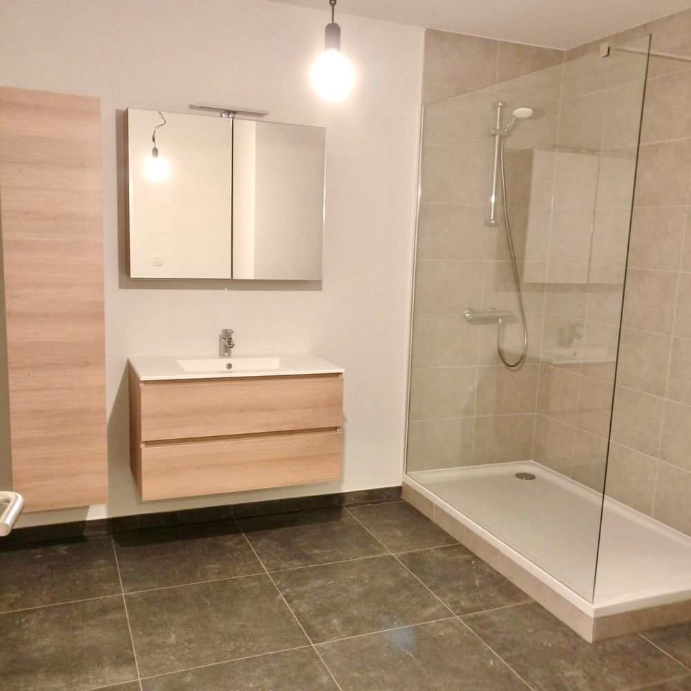 Modern gelijkvloers appartement met terras en tuintje in Opitter foto 10