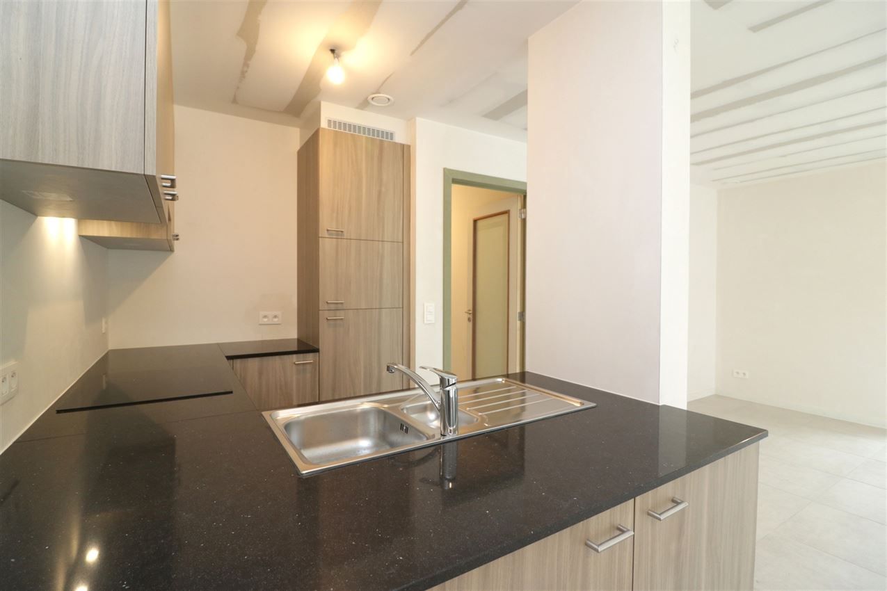 splinternieuw, gelijkvloers, ruim terras, 2 slpk foto 12