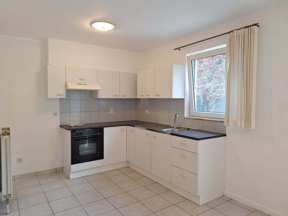 Stijlvol gelijkvloers appartement met terras en autostandplaats foto 9
