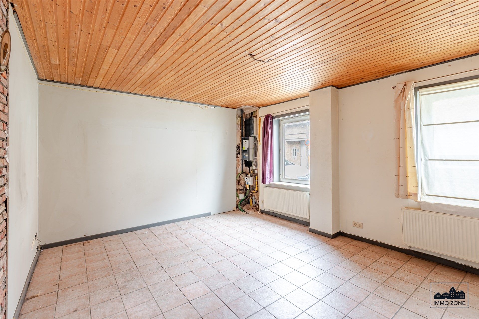 Te renoveren woning in centrum Hamme met veel potentieel foto 3
