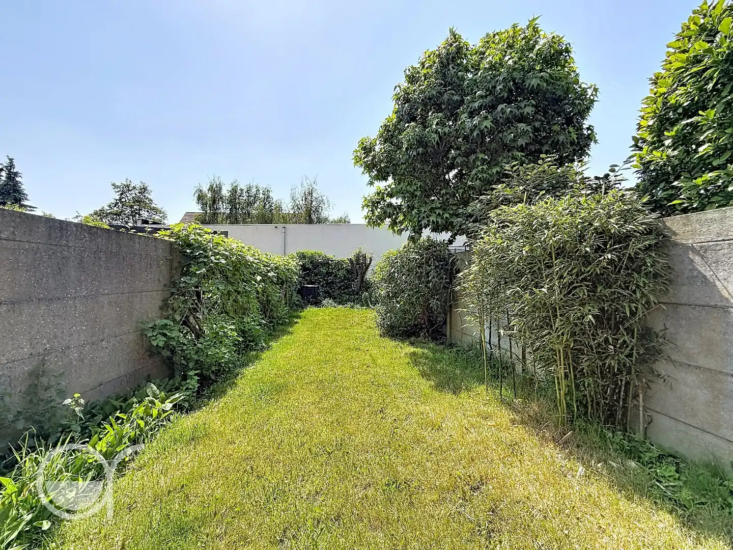 Rijwoning met 2 slaapkamers en zonnig stadstuintje in centrum Drongen foto 8