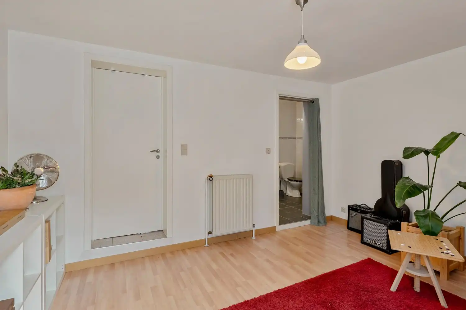Goed gelegen woning met 4 slaapkamers, 2 badkamers, een garage met een autostaanplaats ervoor en een zuidwest georiënteerde tuin te Kessel-Lo! foto 4