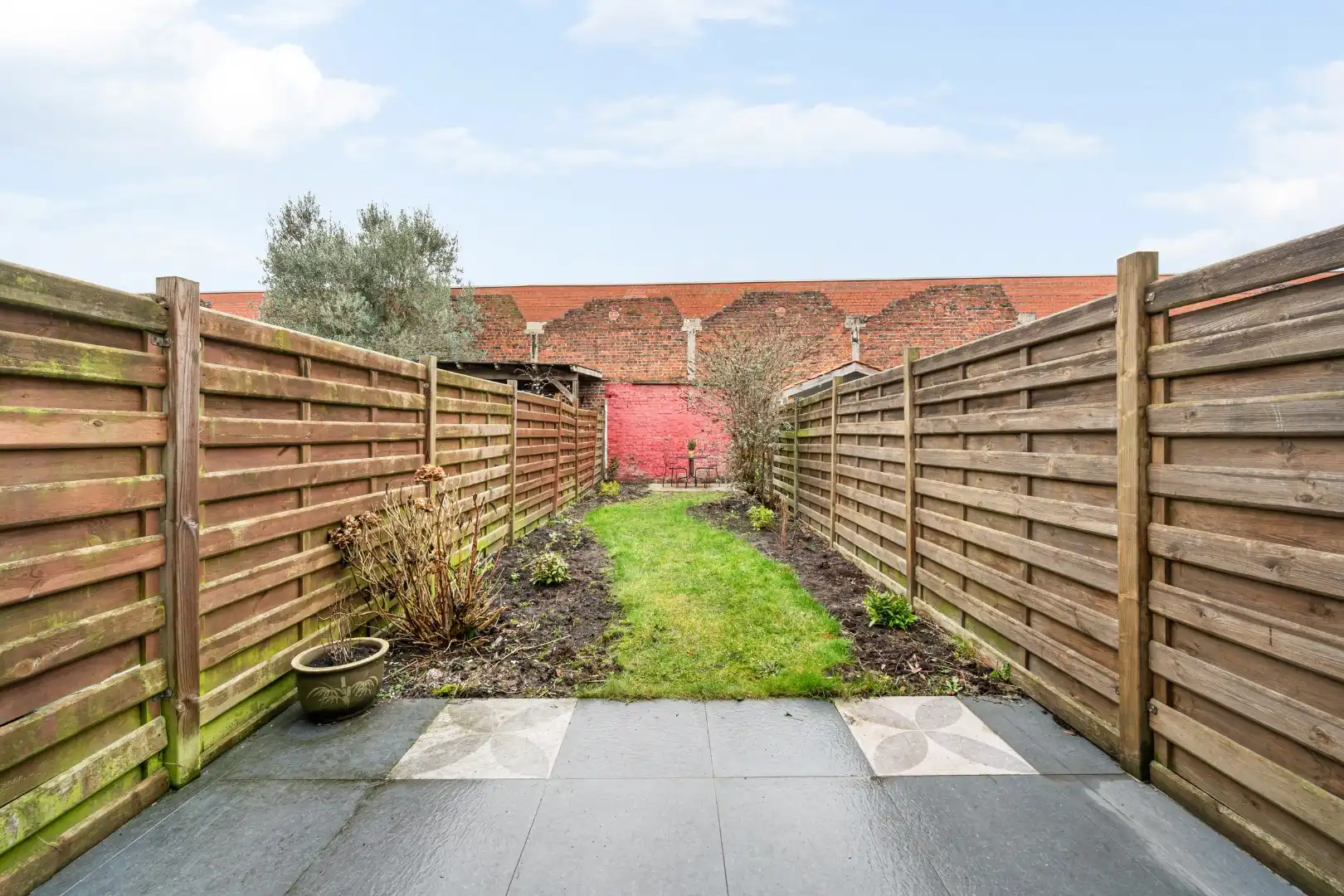 Instapklare woning met 3 slaapkamers en verzorgde stadstuin in Kortrijk foto 4