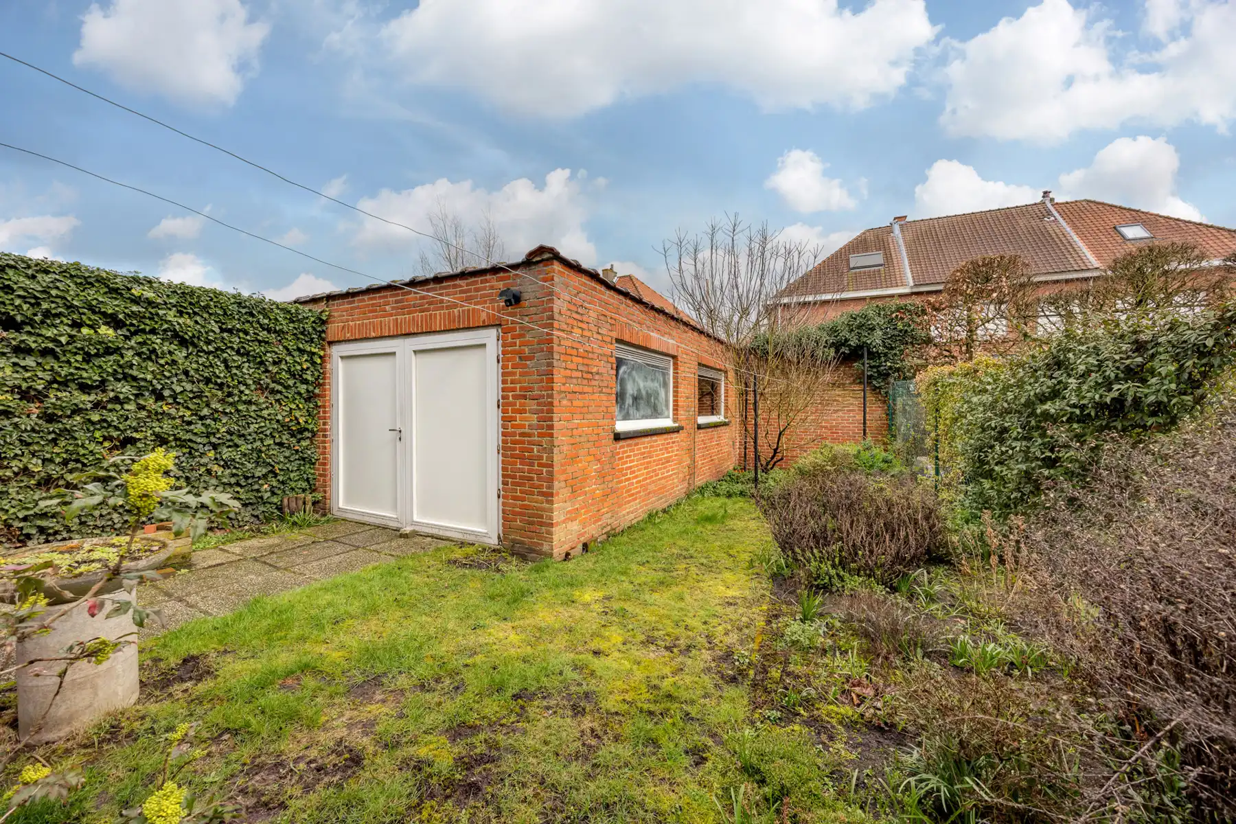 Half-open bebouwing met potentieel, nabij centrum van Schoten foto 12