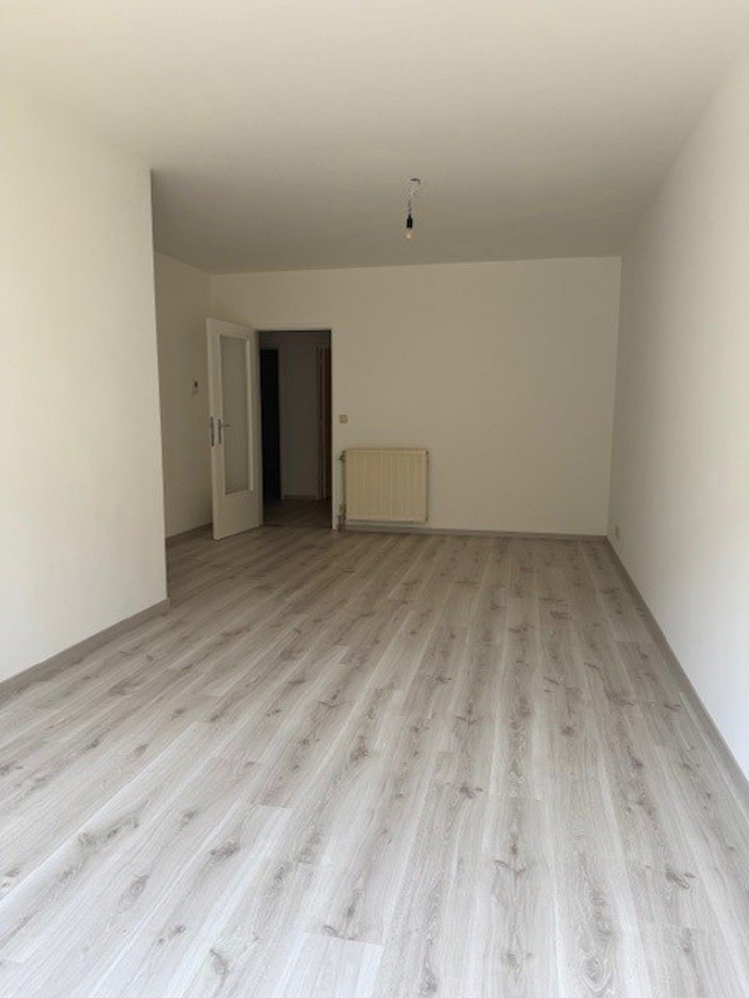 Deels gerenoveerd gelijkvloers appartement. foto 4