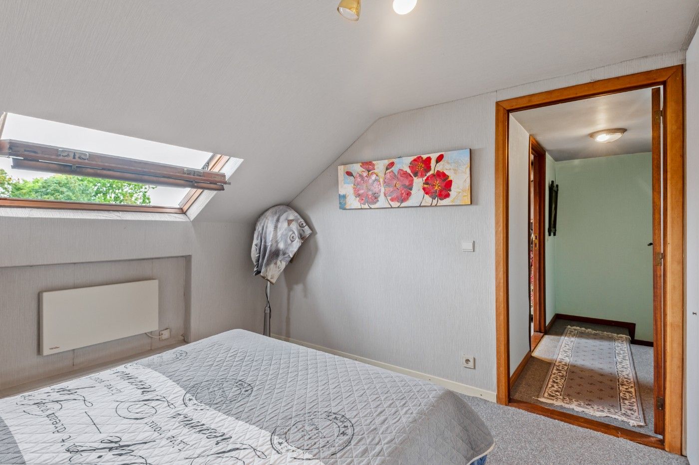 Te renoveren bel-etagewoning met 3 slpk., inpandige garage en tuin foto 16
