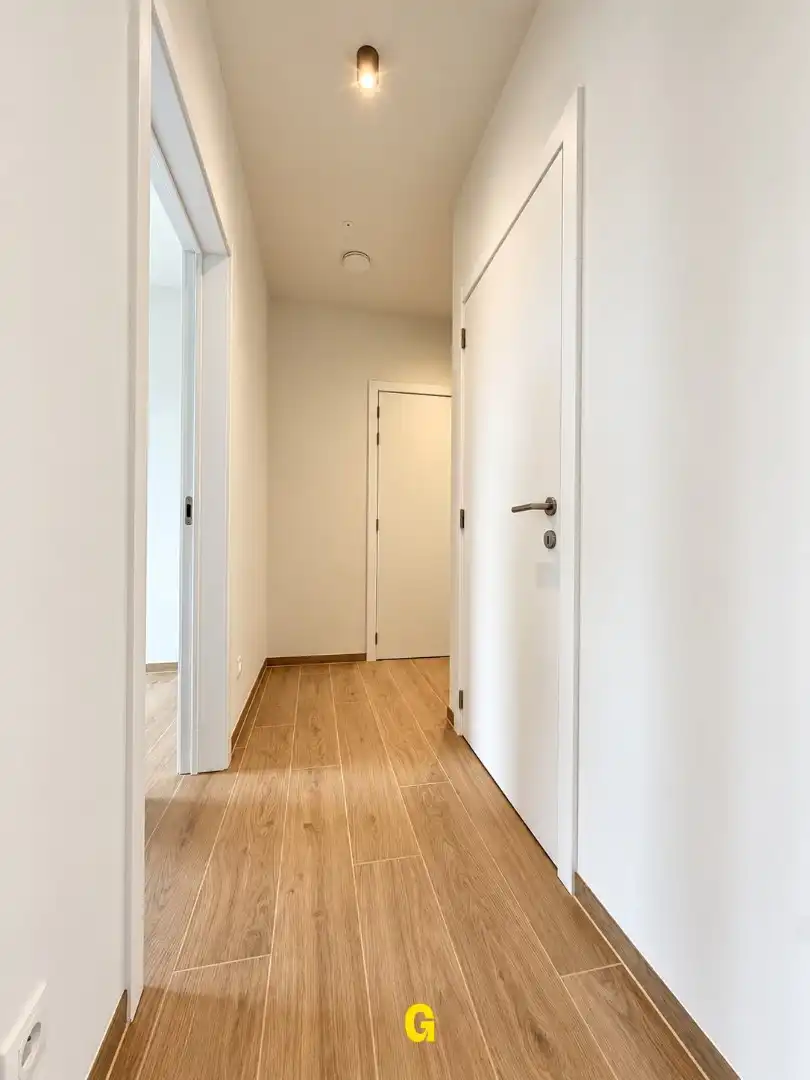 Nieuwbouwappartement met 2 slaapkamers, ruim terras, standplaats en berging te Munsterbilzen - Label A foto 24