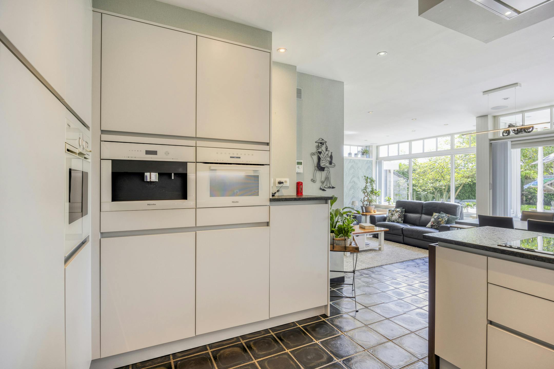 Riante zorgwoning/kangoeroewoning met loods te koop foto 8