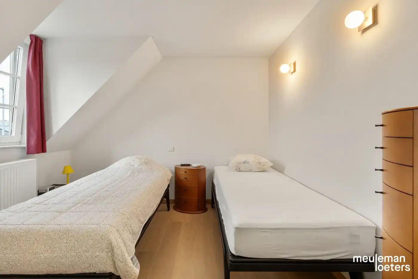 Riant en instapklaar duplexappartement met zéér ruime garagebox in centrum  foto 8