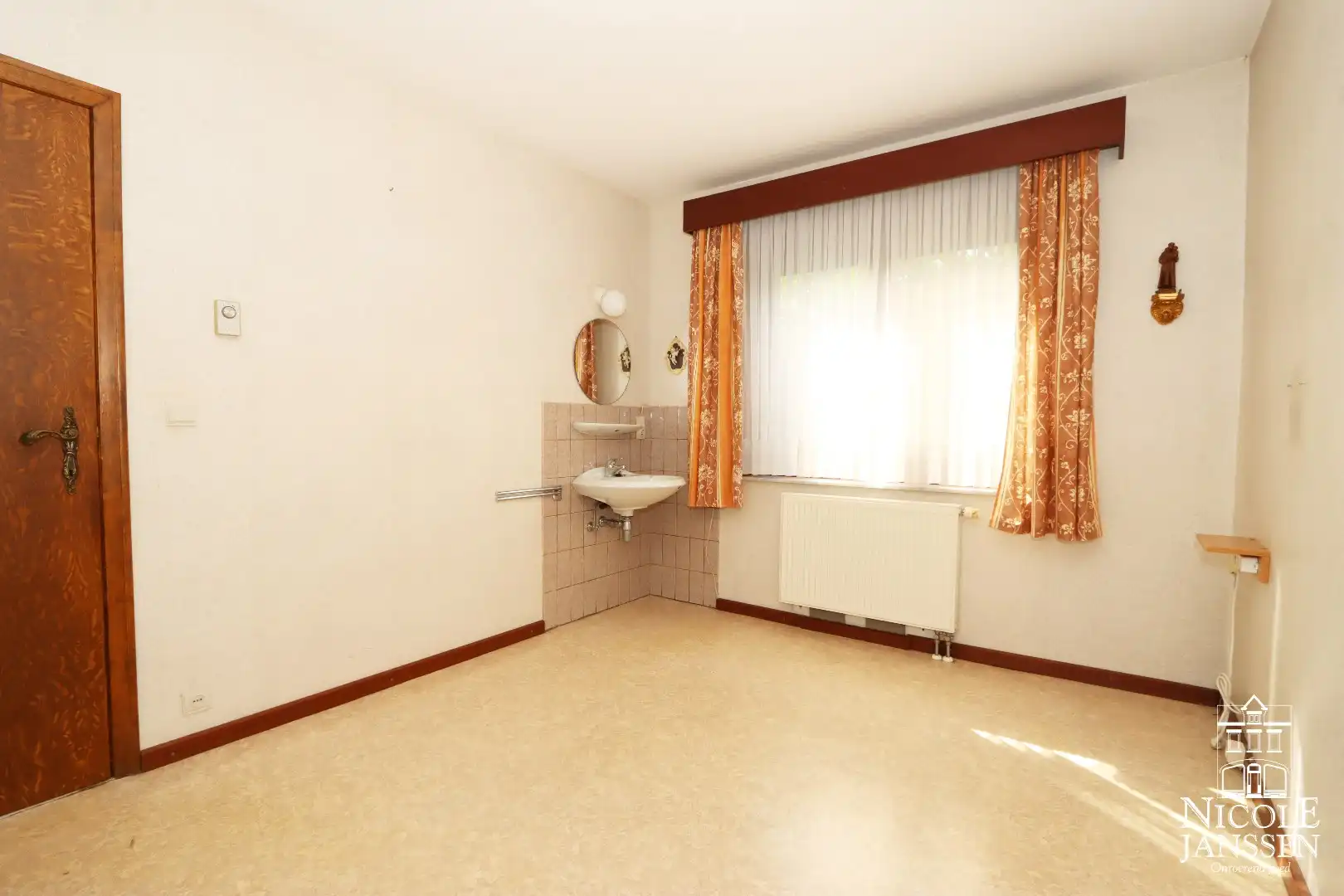 Gelijkvloerse verzorgde woning nabij het centrum van Maaseik foto 10