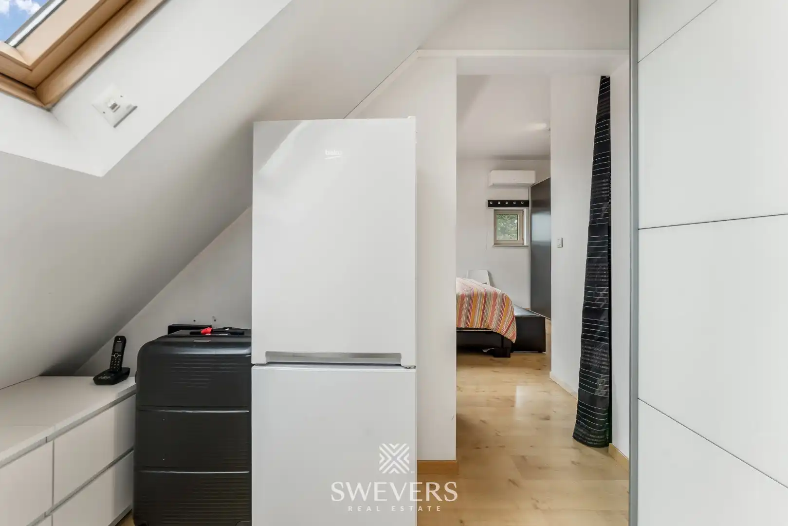 Ruim duplex appartement met 2 slaapkamers en garage foto 22