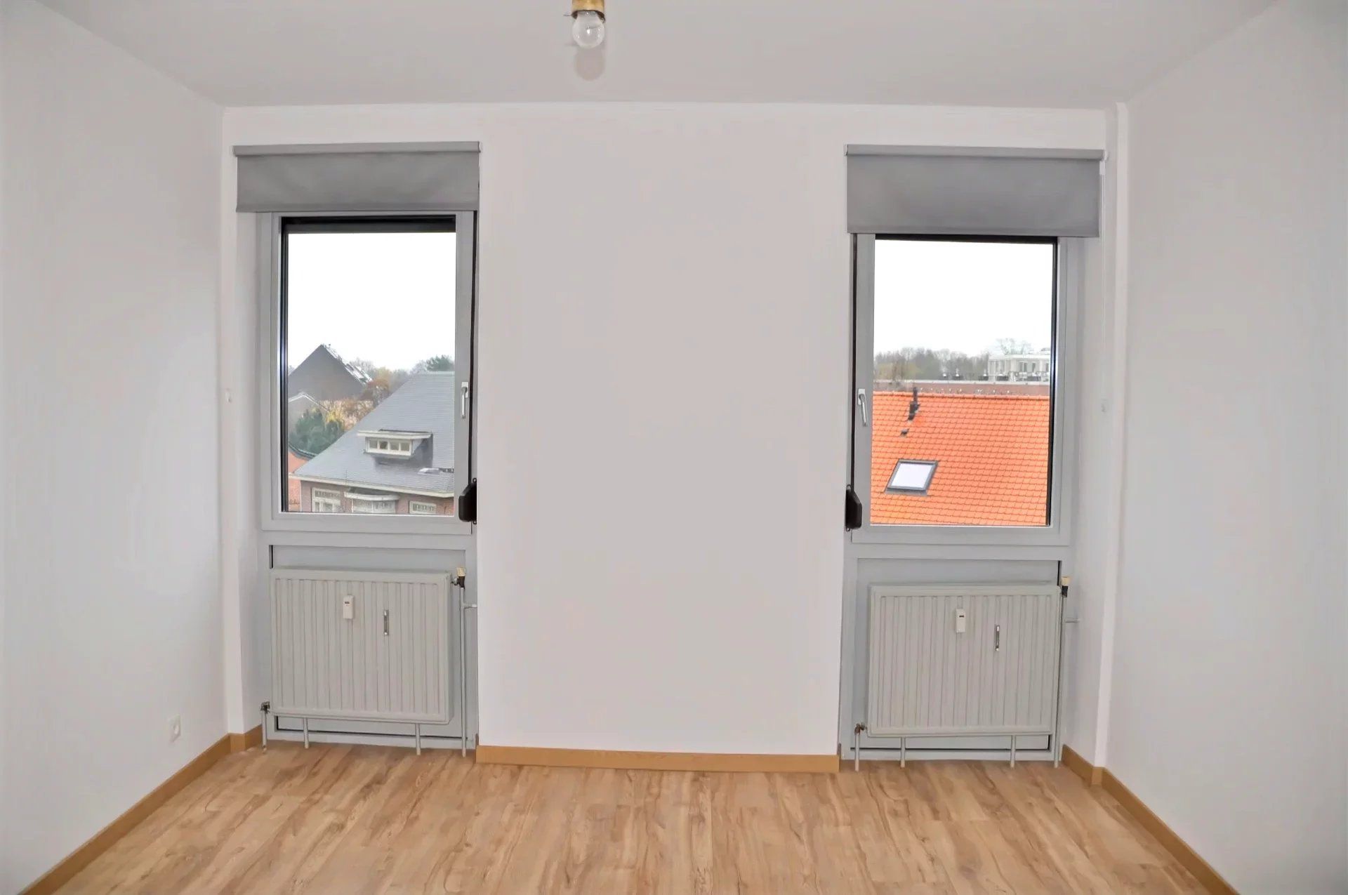 VERRASSEND APPARTEMENT MET 3 SLPK'S EN PARKEERPLAATS IN LANAKEN CENTRUM foto 18