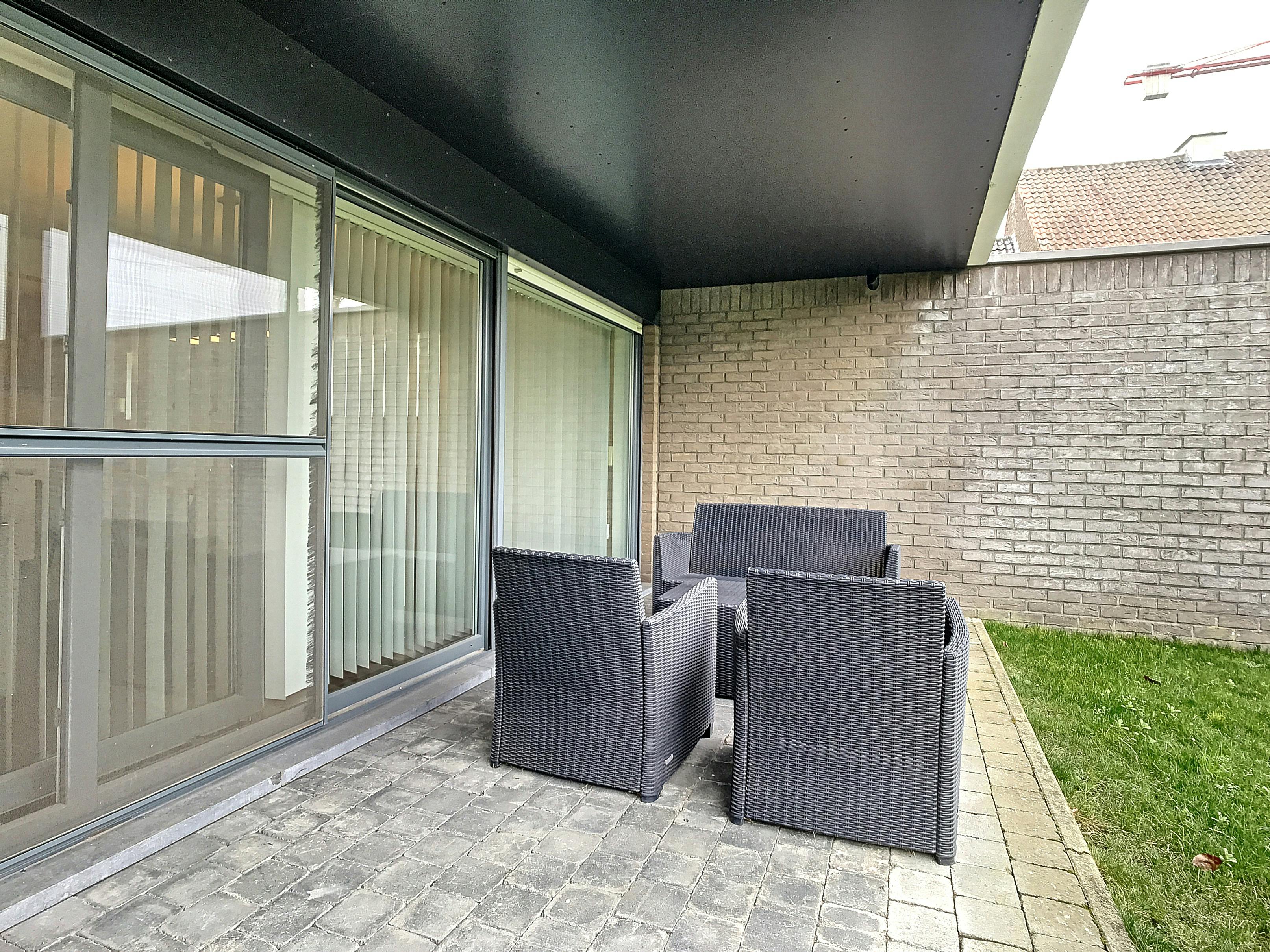 Gezellig gelijkvloers appartement met 2 slaapkamers en tuin foto 12
