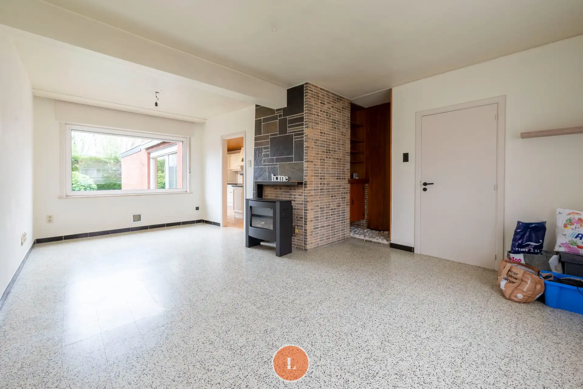 Op te frissen gezinswoning met 3 slaapkamers, tuin en garage. foto 4