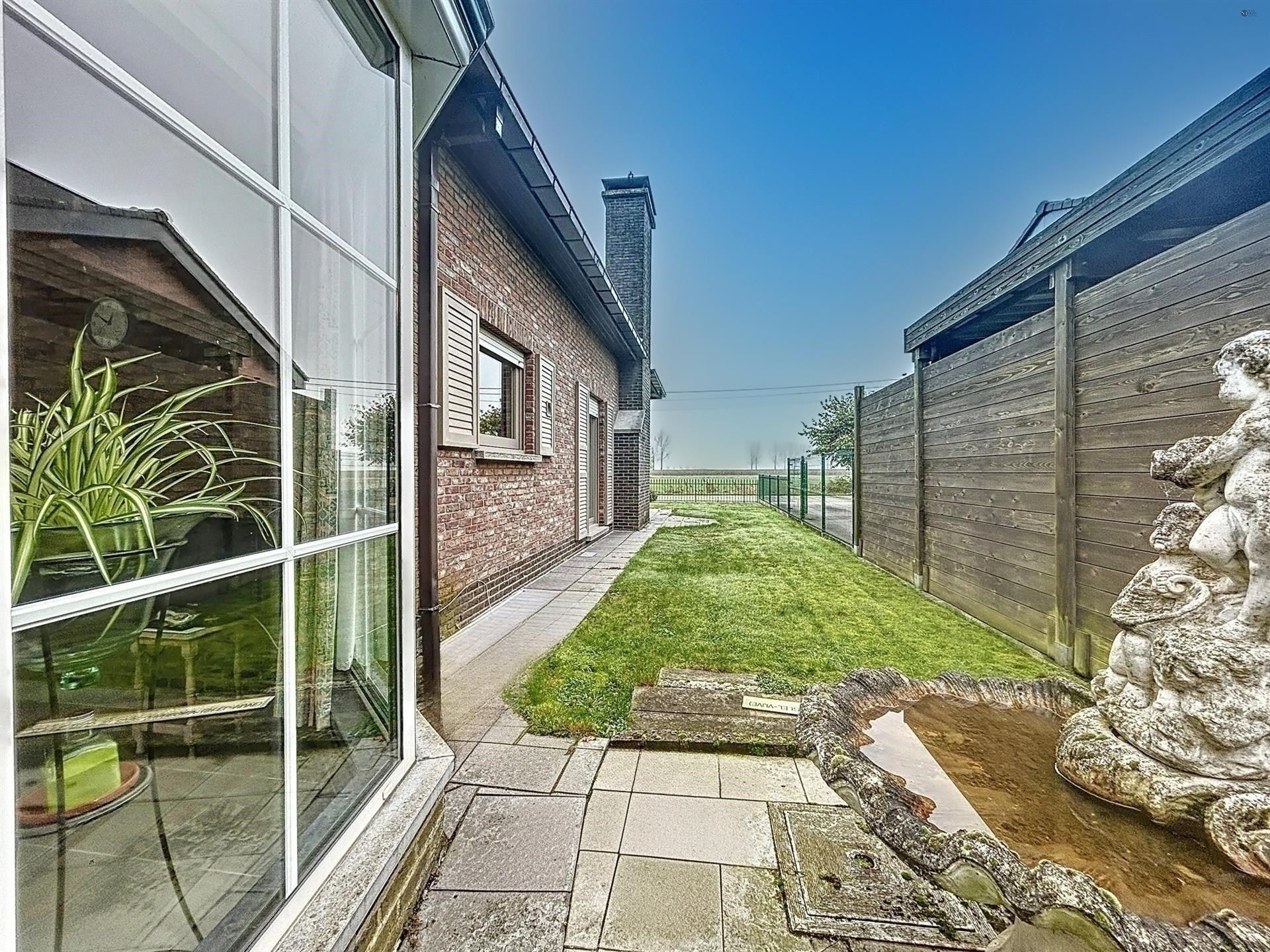 Goed onderhouden woning op perceel van 605 m² foto 19