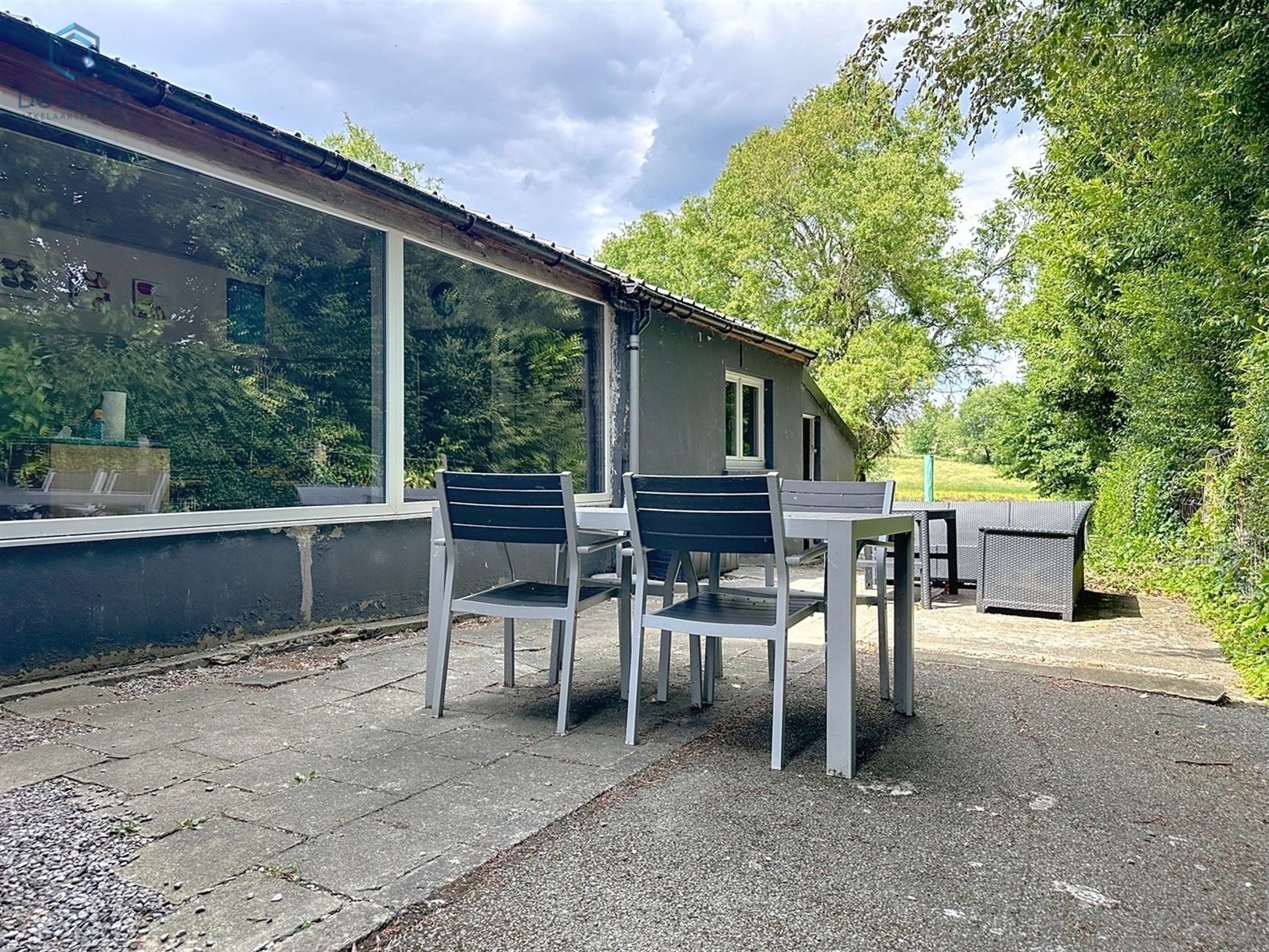 Instapklare halfopen woning met zonnige tuin en tal van troeven! foto 3
