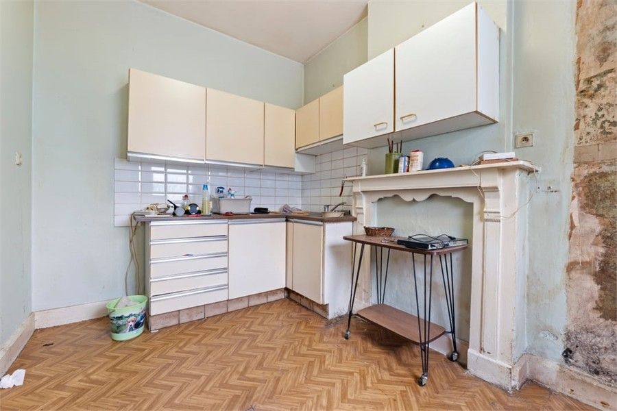 TE RENOVEREN GEZINSWONING MET LOODS IN HET LANDELIJKE GINGELOM foto 16