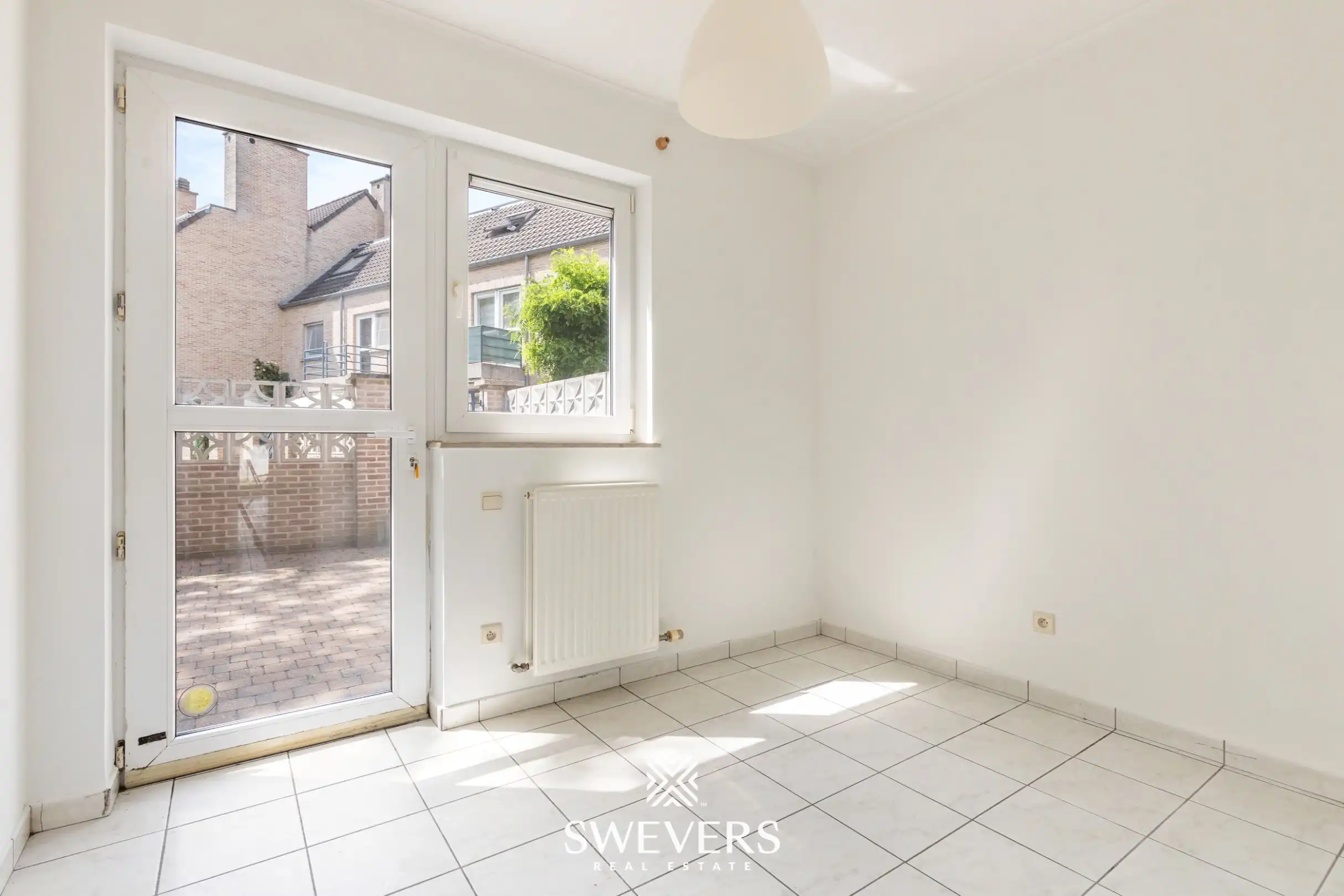Gelijkvloers 2 slaapkamer appartement met terras en grote binnentuin foto 7