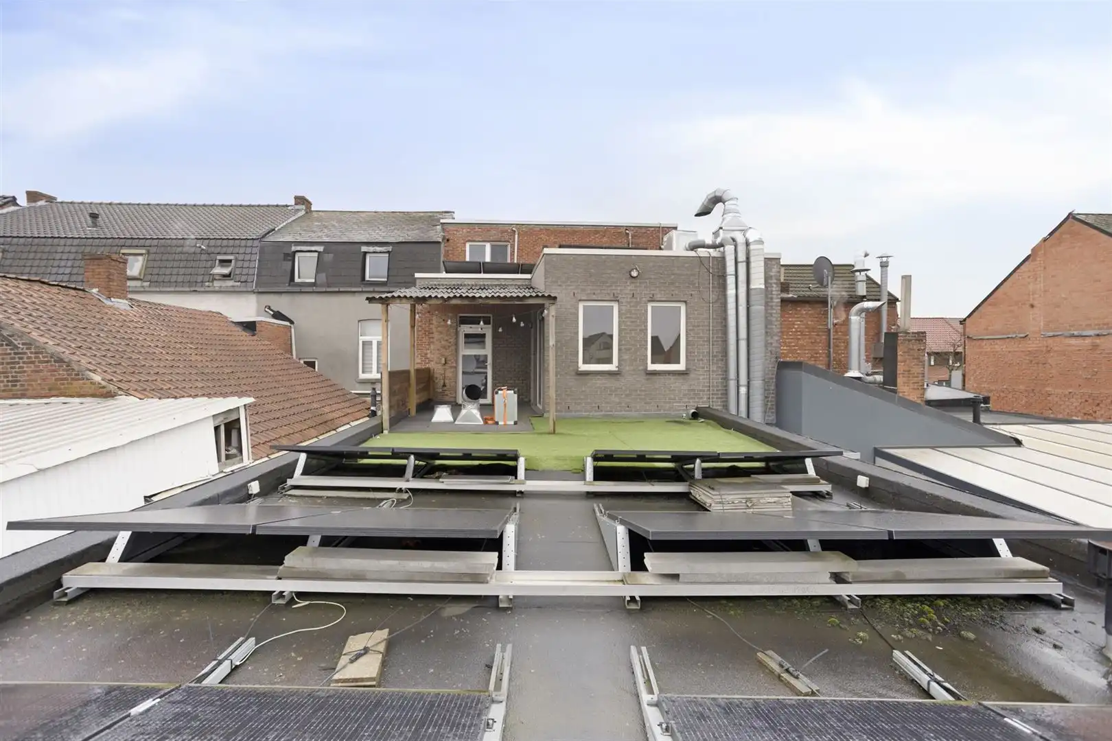 TE KOOP: Opbrengsteigendom in het centrum van Heusden-Zolder! foto 18