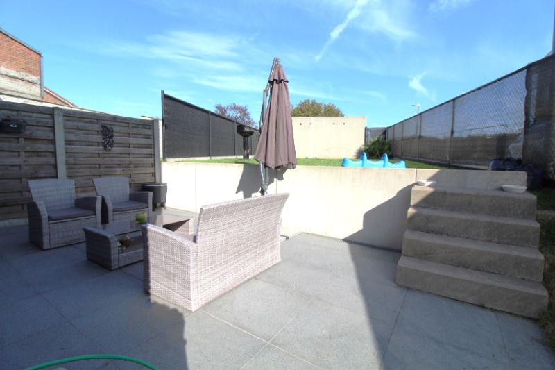 ​​​​​​​Recente halfopen woning in centrum van Heule foto 7