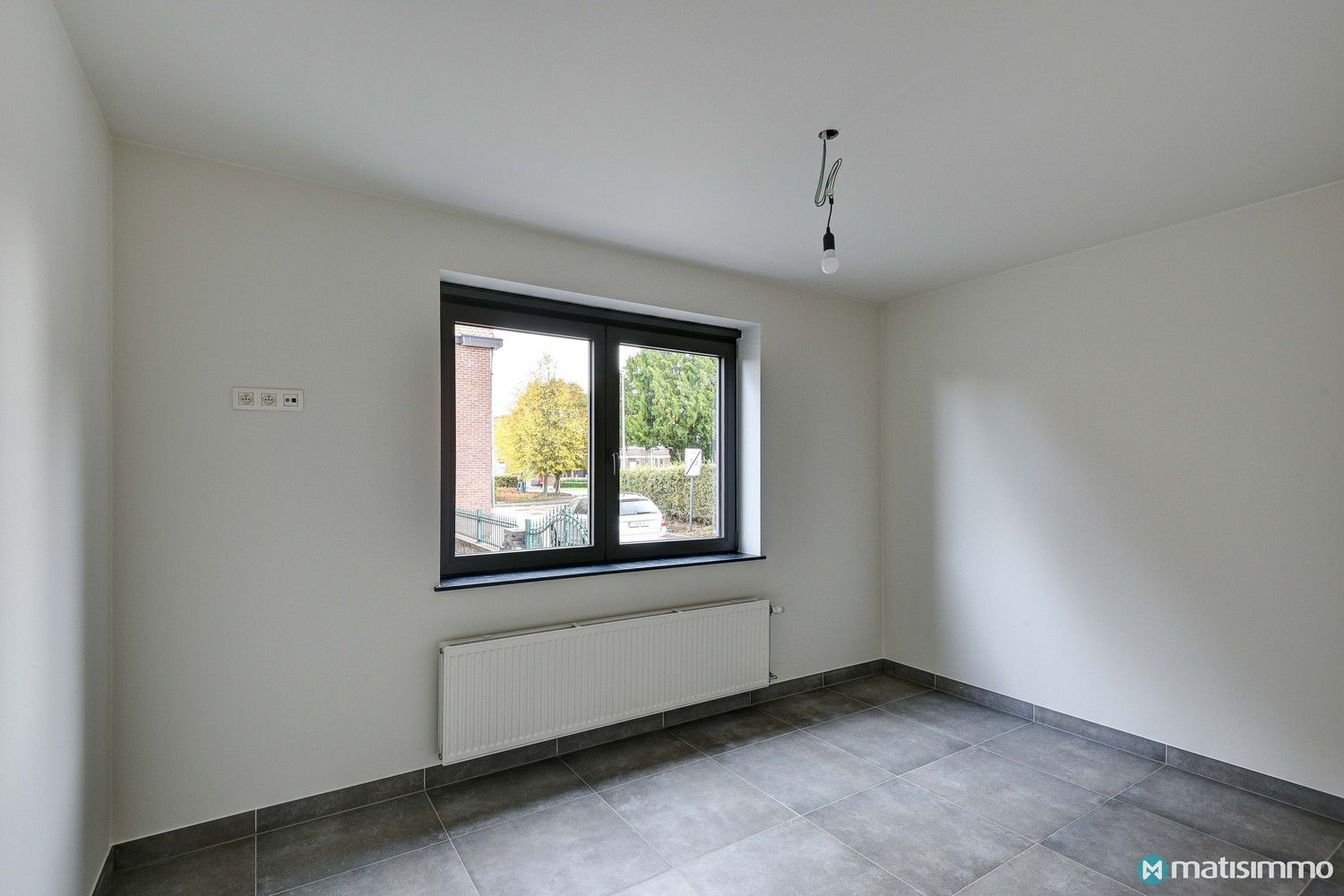 INSTAPKLAAR GELIJKVLOERS APPARTEMENT MET 2 SLAAPKAMERS TE MOPERTINGEN (BILZEN) foto 11