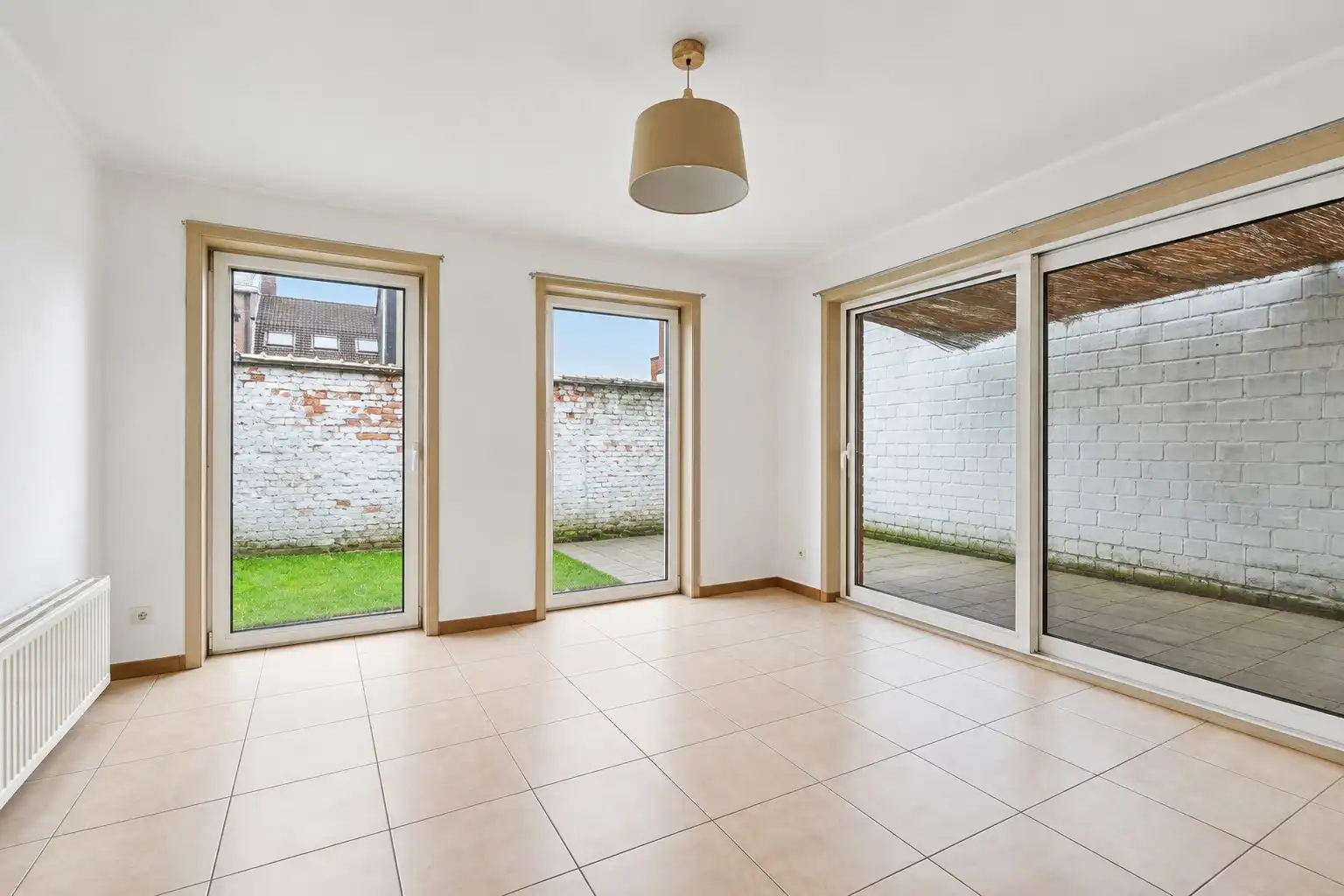 Appartementsgebouw met twee appartementen te koop in Mariakerke foto 3