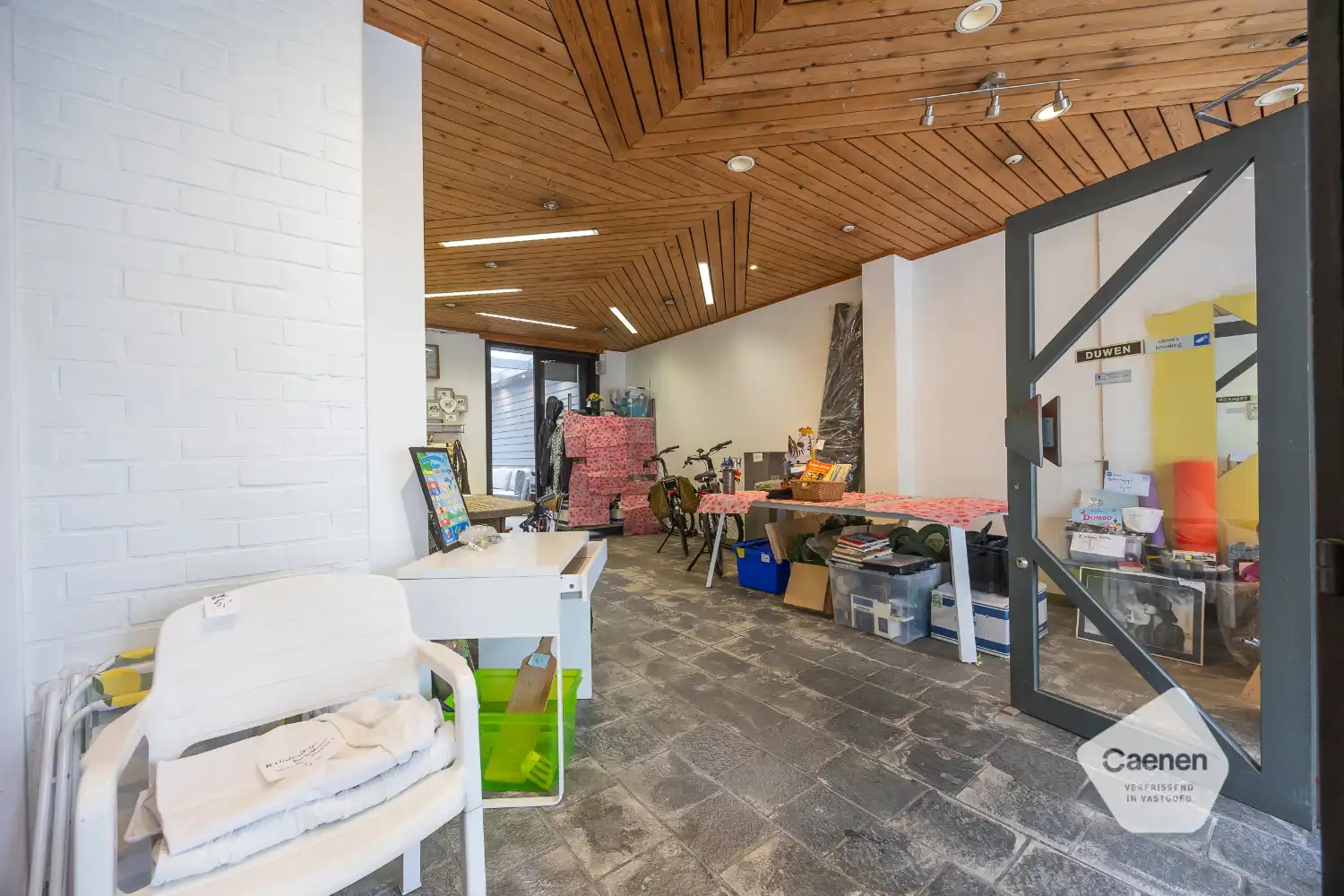 Woning met handelsgelijkvloers op commerciële ligging foto 4