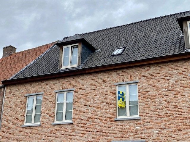 Rustig gelegen, instapklare duplex met 2 slaapkamers, terras en carport foto 2