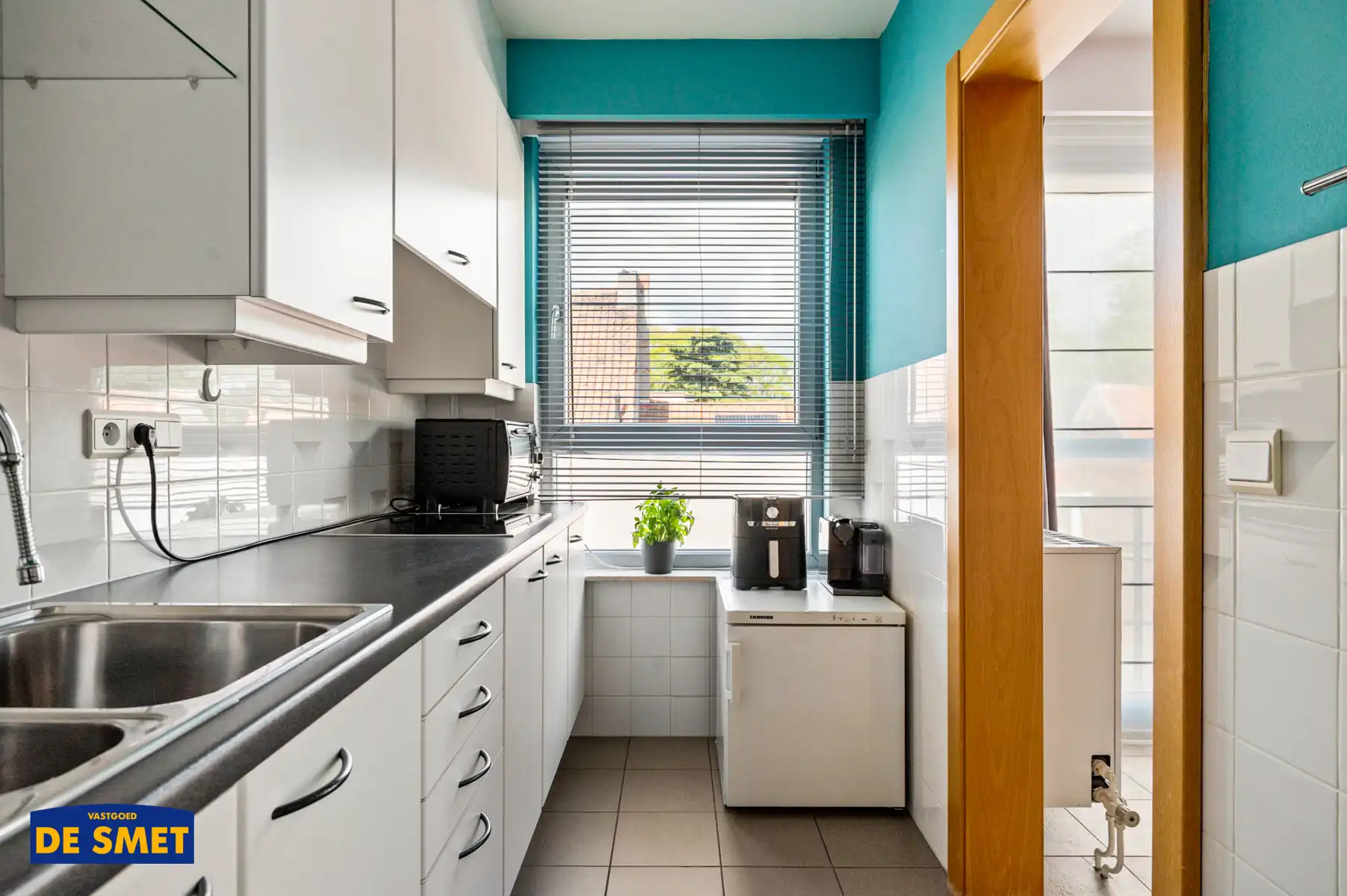 Zéér goed onderhouden appartement met balkon én terras foto 7