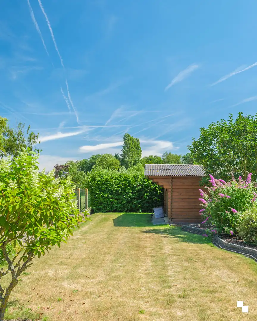Op te frissen woning met gezellige tuin in het hart van Merelbeke foto 24