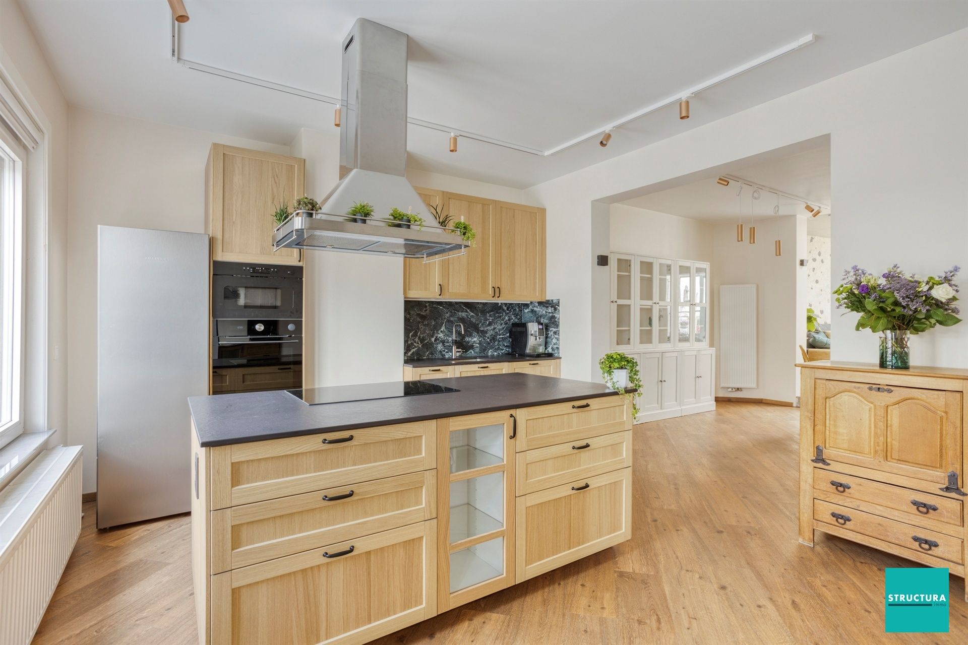 Instapklare woning met zonnige tuin, EPC B en uitbreidingspotentieel foto {{pictureIndex}}