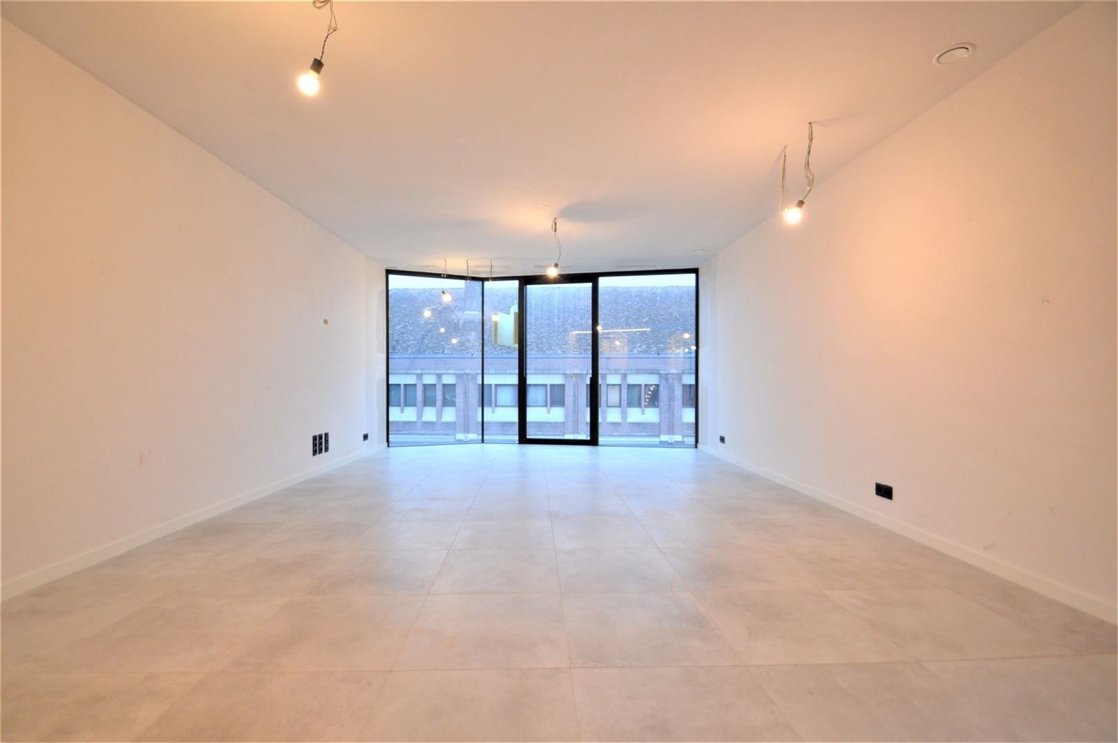 Uitzonderlijk nieuwbouw duplex appartement in hartje centrum Dendermonde foto 4