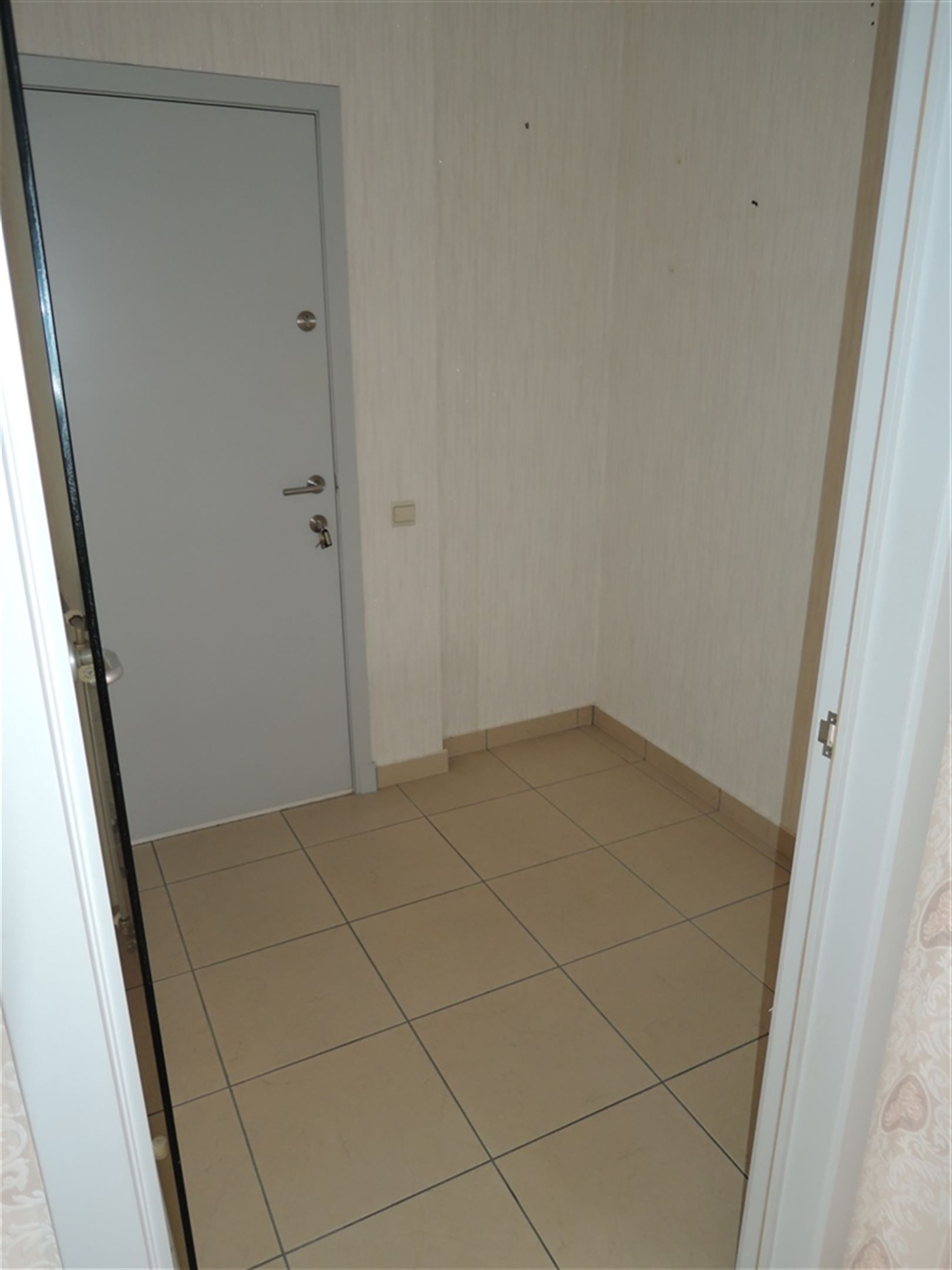 Gelijkvloers appartement met garage box foto 6