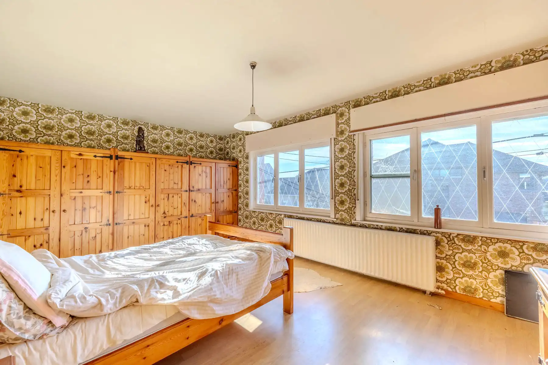 Te renoveren woning met 3 slpk, inpandige garage en tuin foto 16