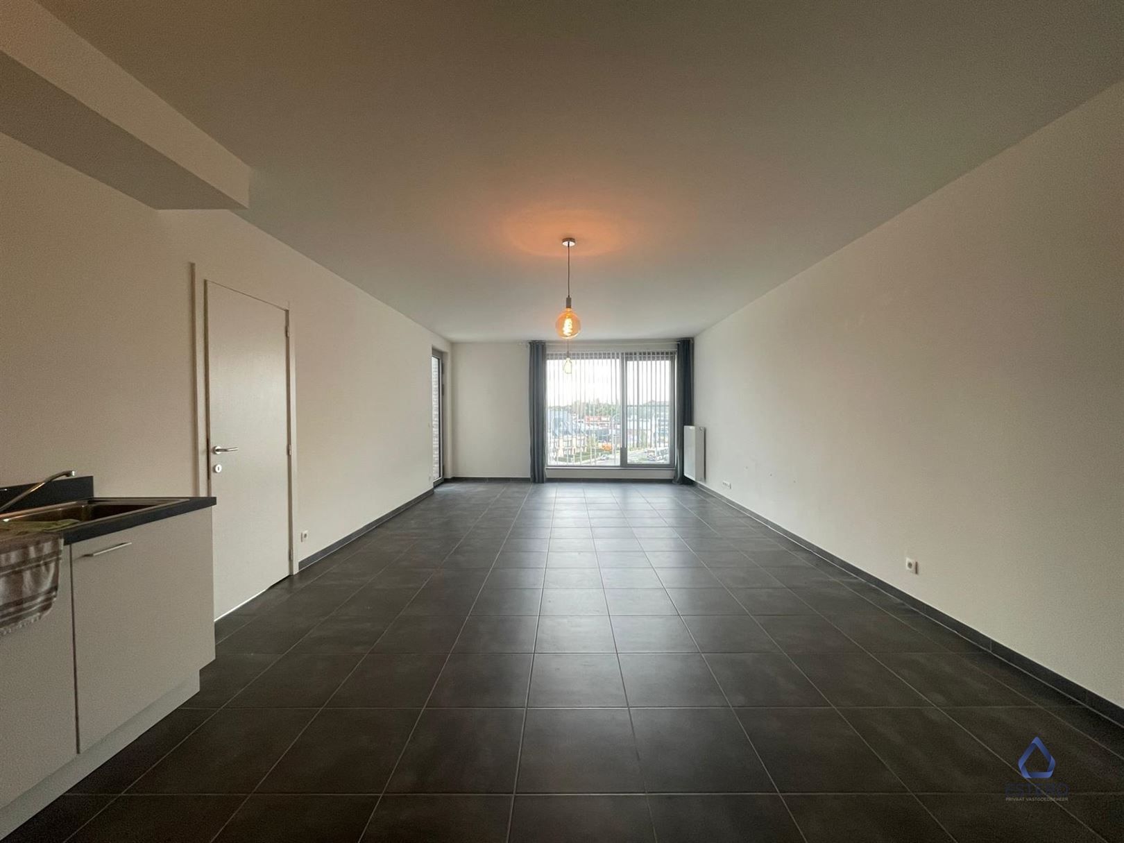 Nieuwbouwappartement met 2 slaapkamers en tuintje foto 4