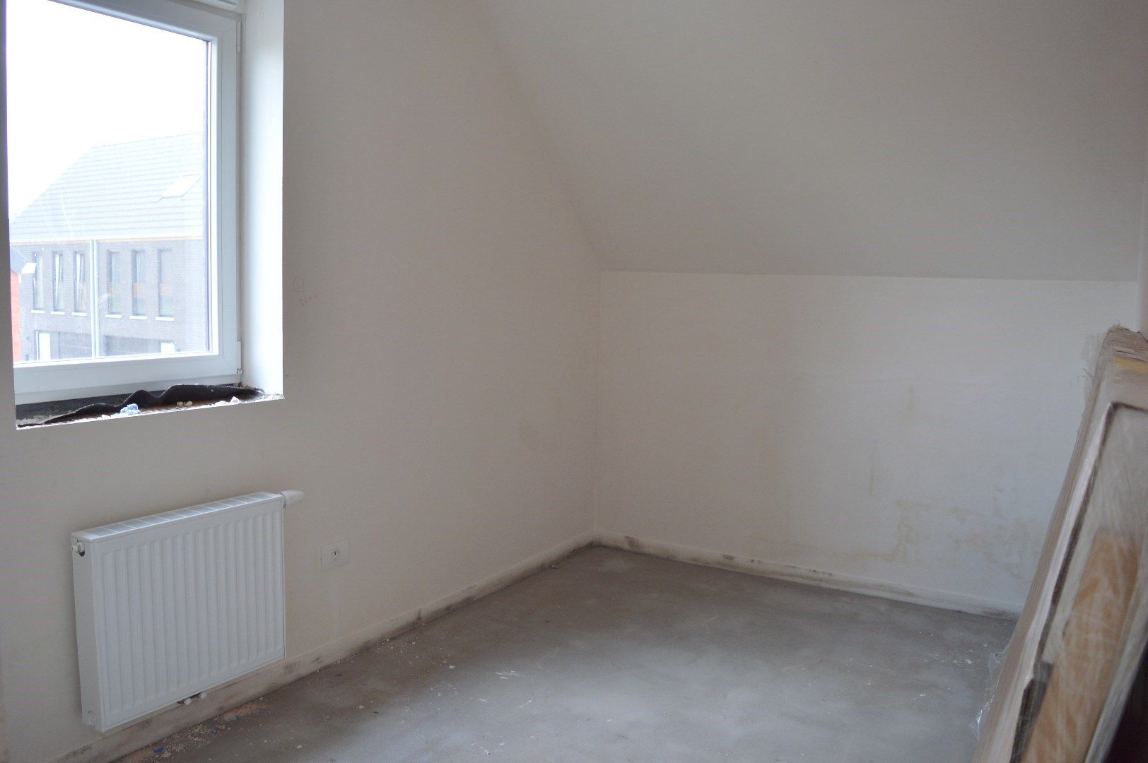 Instapklare woning met 3 slaapkamers en carport in kindvriendelijke ligging te Heule foto 8