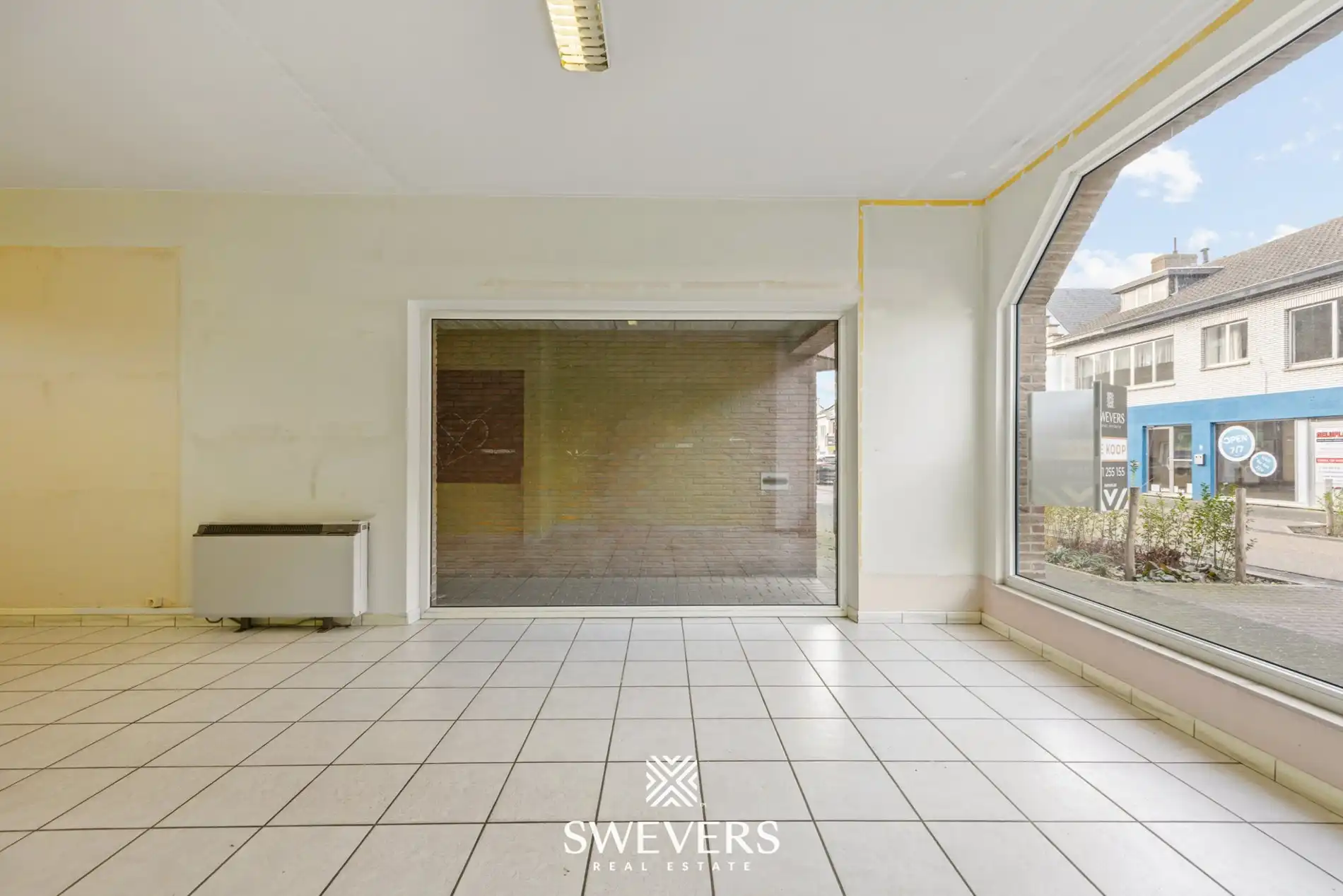 Commercieel pand met garage in centrum Beringen foto 14