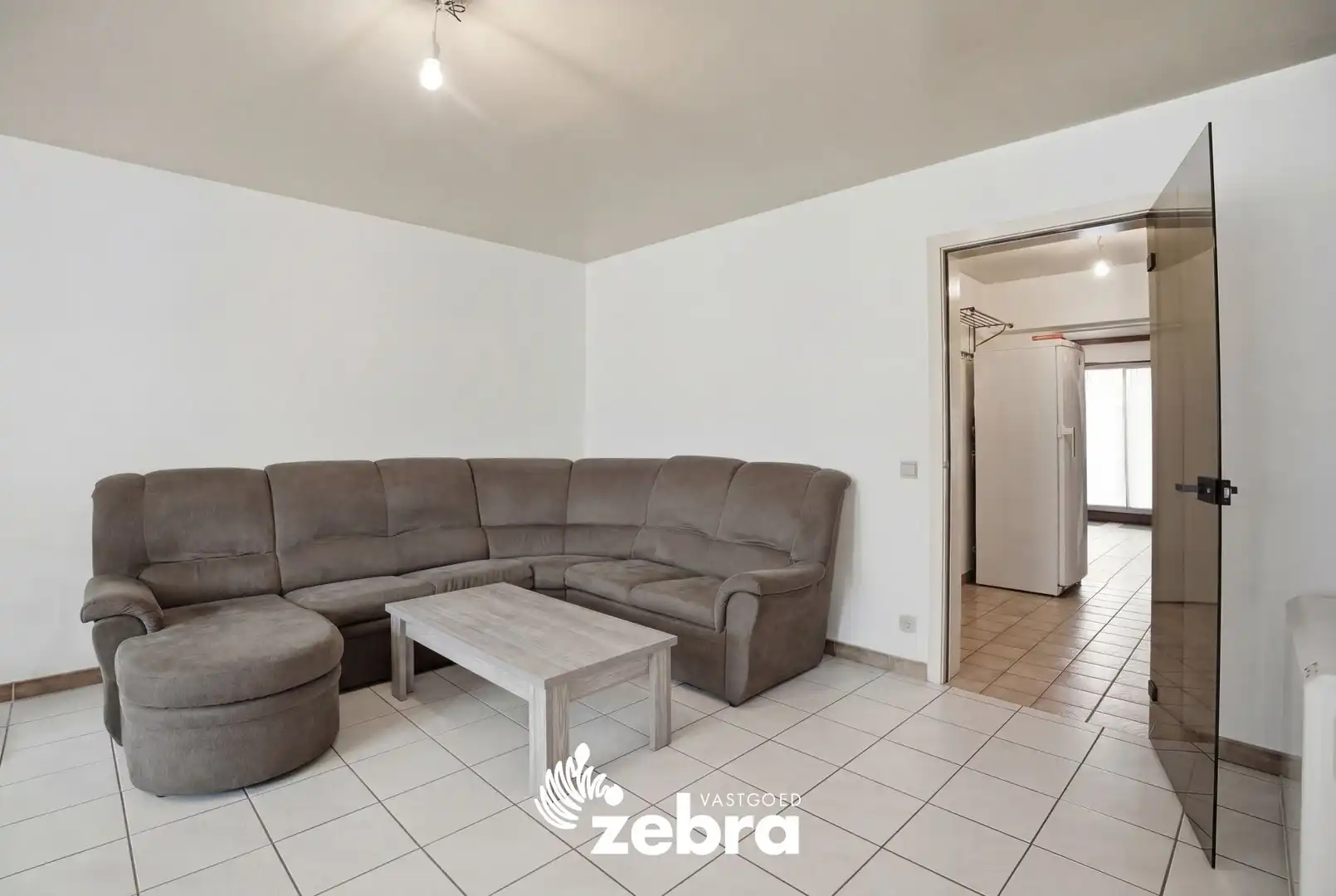 Gelijkvloers 2-slaapkamerappartement met terras en garage in centrum Tielt! foto 4