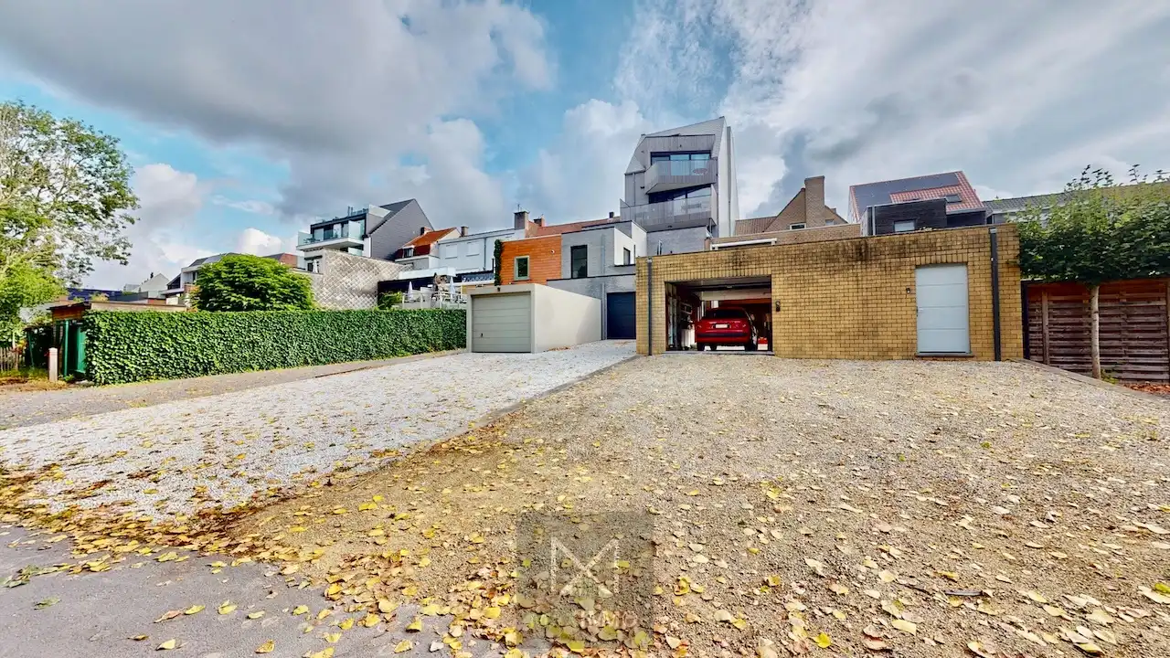 Handelspand met ruime woonst, stadstuin & dubbele garage in Rekkem foto 24