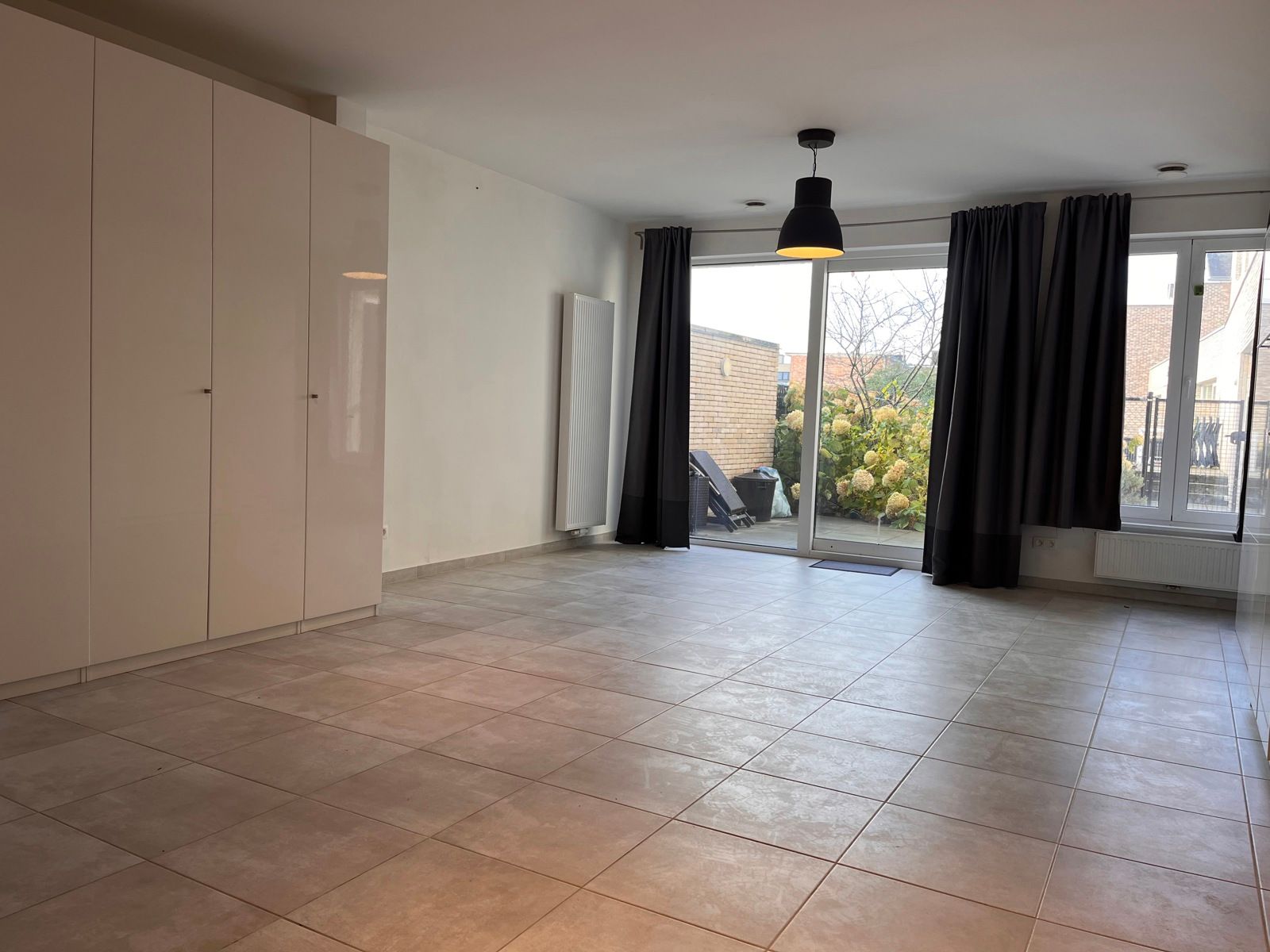 Gelijkvloers appartement te huur + garage foto 6