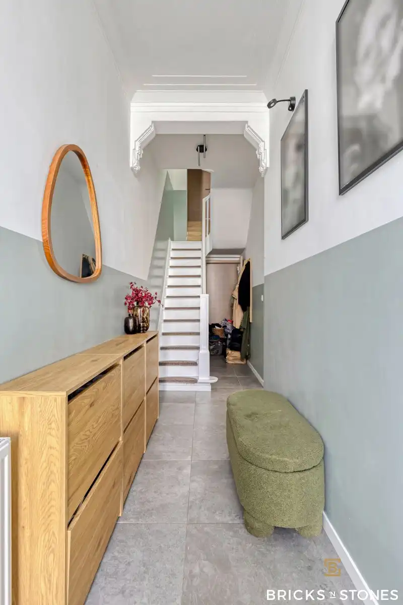Leuke instapklare woning met 4 slpkms en tuin foto 2