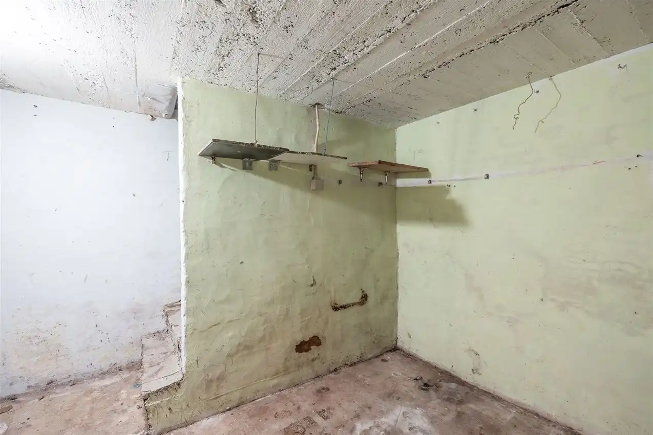 Op te frissen rijwoning in het centrum foto 22