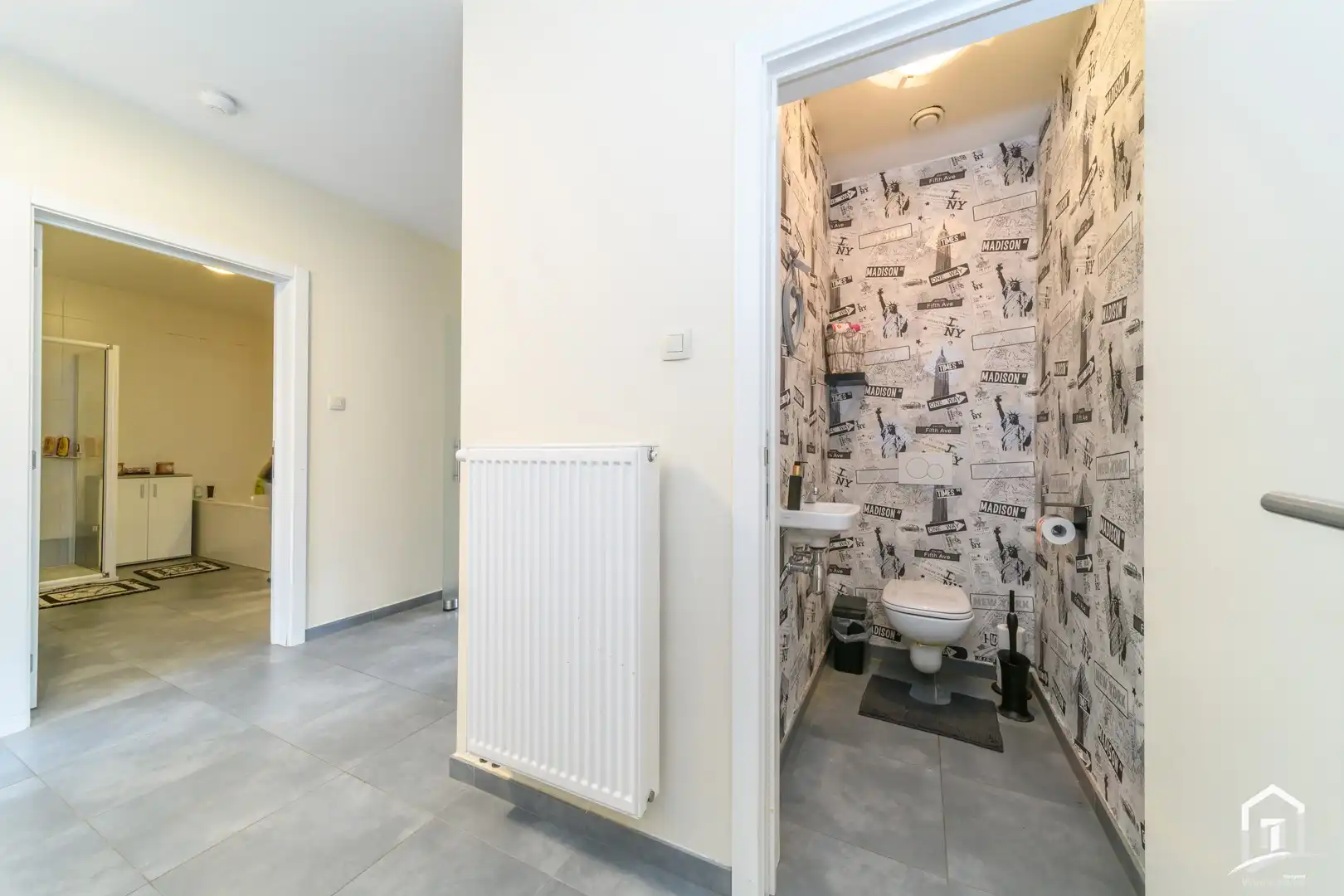 Ruim gelijkvloers appartement met 2 slaapkamers en tuin ! foto 12