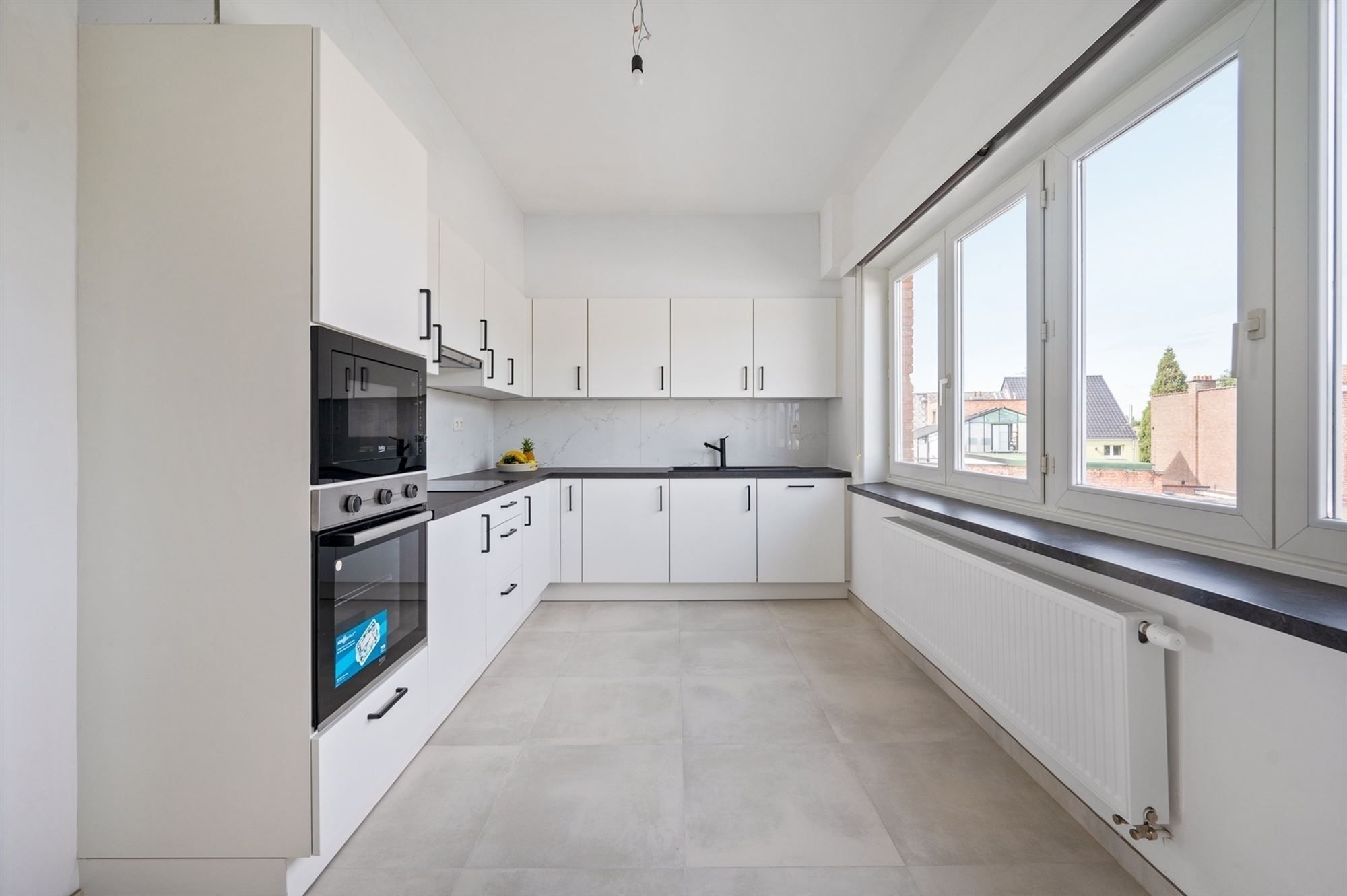 Gerenoveerd en lichtrijk appartement te Mechelen foto 7